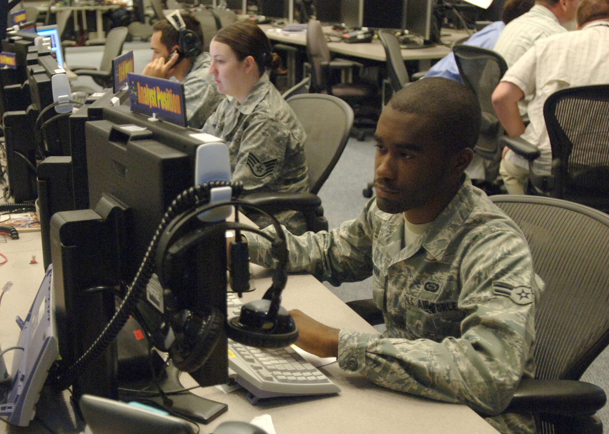 LANGLEY AIR FORCE BASE, Va. -- Airman 1st Class David Thurman, 13th Intelligence Sqaudron imagery analyst, tracks data provided by reconnaissance aircraft August 12 during Empire Challenge 10 at the Ryan Center.  The EC10 exercise was an annual Joint and Coalition ISR interoperability demonstration which pulled resources worldwide to showcase emerging ISR capabilities and provide vital lessons learned to improve support to warfighters at the tactical level. (U.S. Air Force
Photo/Tech Sgt Randy Redman)
