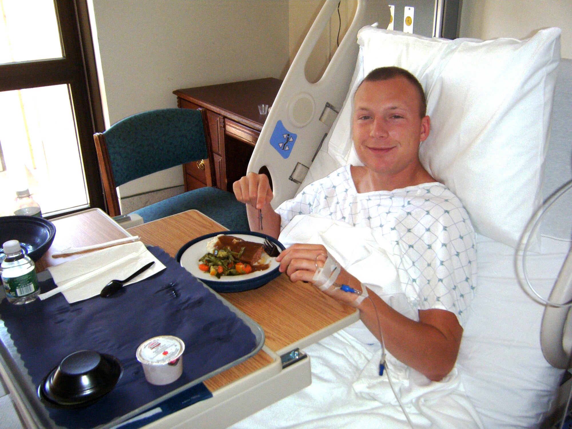 Only a few hours after donating bone marrow to a critical patient, Staff Sgt. Charles F. Newberry recovers Aug. 11, 2010, in his Washington D.C. hospital room. Sergeant Newberry said his recovery was fast, and he was walking around the day after his surgery. (U.S. Air Force photo)
