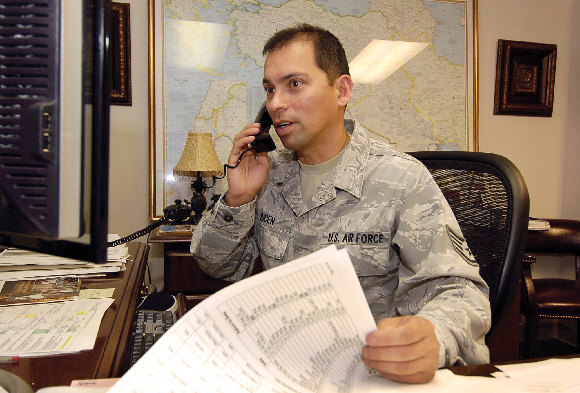 Staff Sgt. Kirt Dicen is the noncommissioned officer in charge of chapel operations.  On base, chaplain assistants help chaplains serve many Airmen, with such varied duties as planning for a funeral to keeping the chapel running smoothly. When deployed, assistants are the eyes and ears for chaplains within the enlisted ranks when some Airmen may feel anxious talking with an officer chaplain or religious figure at first.  And since chaplains are non-combatants, the assistants also act as physical protection when deployed. (Air Force photo by Margo Wright)