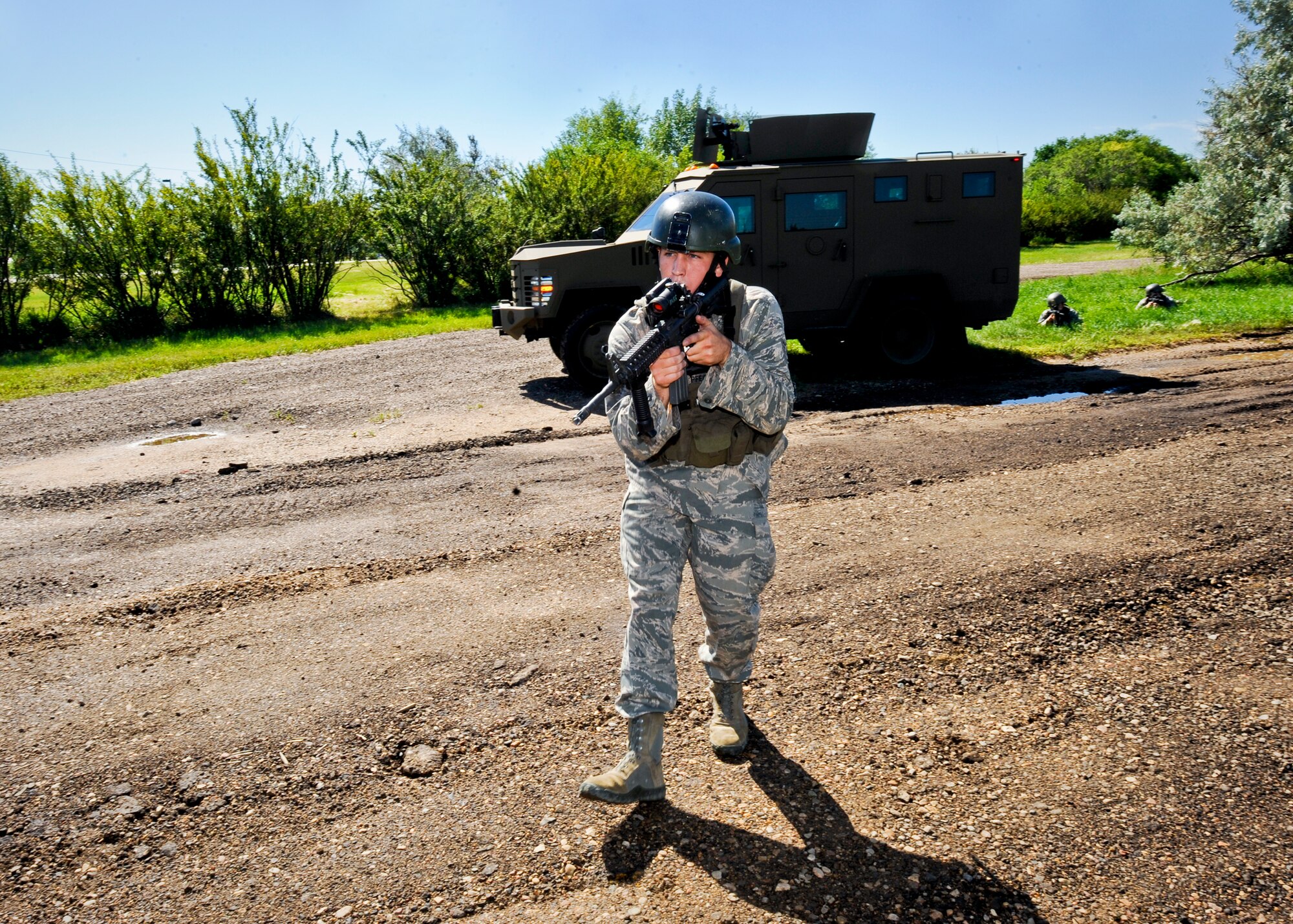 MINOT AIR FORCE BASE, N.D. -- Staff Sgt. Ryan Pfeifer, 791st Missile Security Forces Squadron convoy response force leader, participates in a recovery and recapture exercise during a convoy training mission here Aug. 12. (U.S. Air Force photo by Senior Airman Benjamin Stratton)