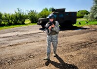 MINOT AIR FORCE BASE, N.D. -- Staff Sgt. Ryan Pfeifer, 791st Missile Security Forces Squadron convoy response force leader, participates in a recovery and recapture exercise during a convoy training mission here Aug. 12. (U.S. Air Force photo by Senior Airman Benjamin Stratton)