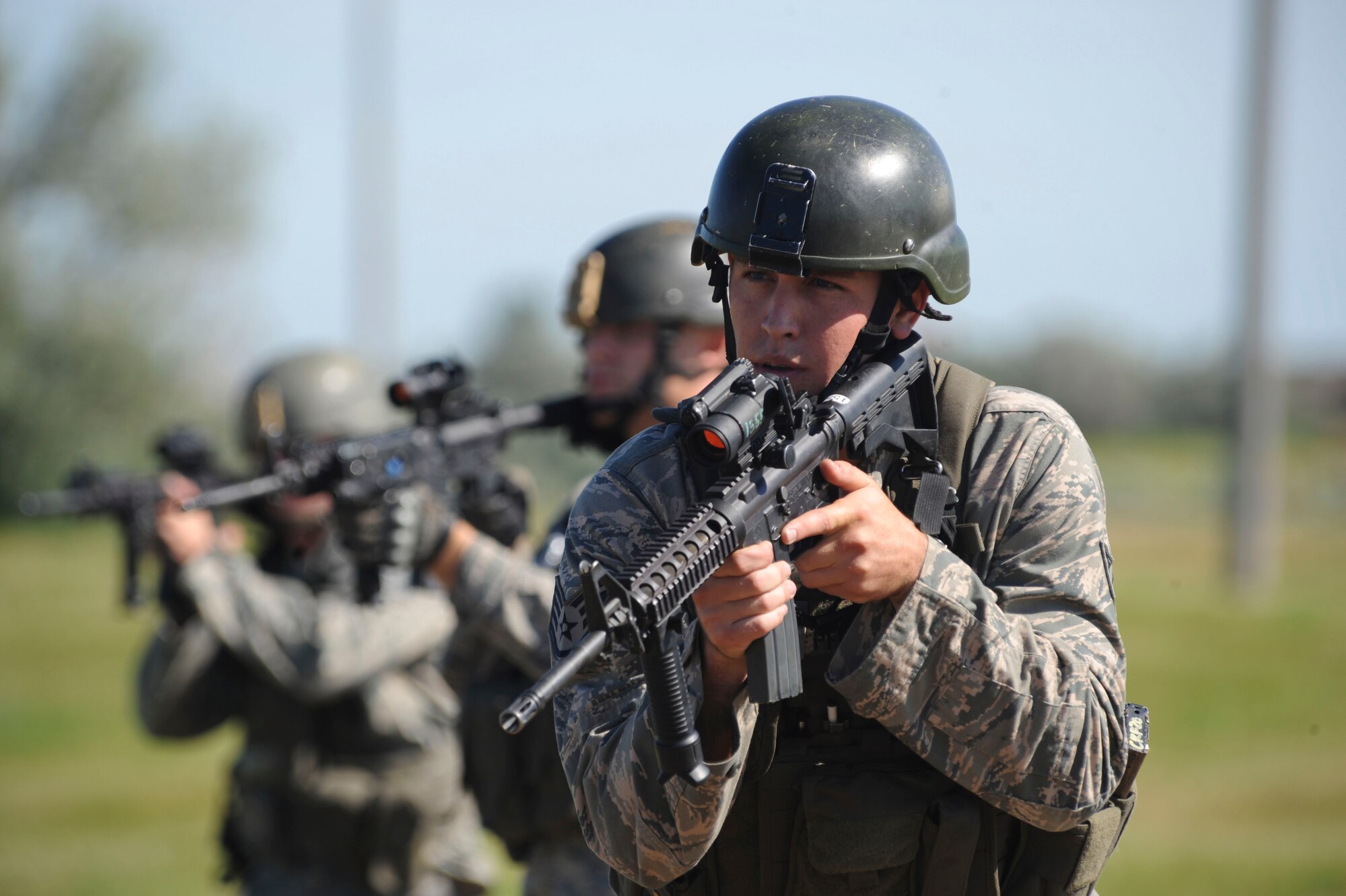 MINOT AIR FORCE BASE, N.D. -- Staff Sgt. Ryan Pfeifer, 791st Missile Security Forces Squadron convoy response force leader, diligently moves toward a simulated missile site during a convoy training mission here Aug. 12. Sergent Pfeifer was recently named one of the Air Force’s 12 Outstanding Airmen of the year. (U.S. Air Force photo by Tech. Sgt. Lee A. Osberry Jr.)
