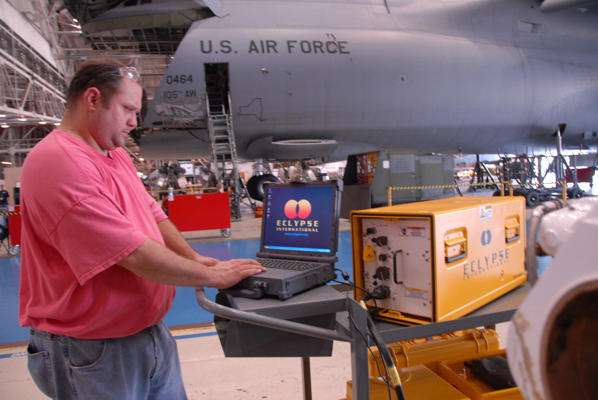 Matt Simpson, aircraft electrician, works with the new automatic wire test set. (U.S. Air Force photo by Wayne Crenshaw)