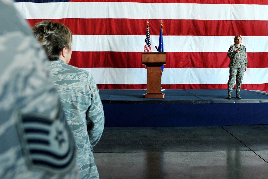 OFFUTT AIR FORCE BASE, Neb. - Team Offutt enlisted members listen to new 55th Wing Command Chief Master Sgt. Suzan Sangster during her first enlisted call here Aug. 11 inside the Bennie Davis Maintenance Facility. U.S. Air Force photo by Charles Haymond