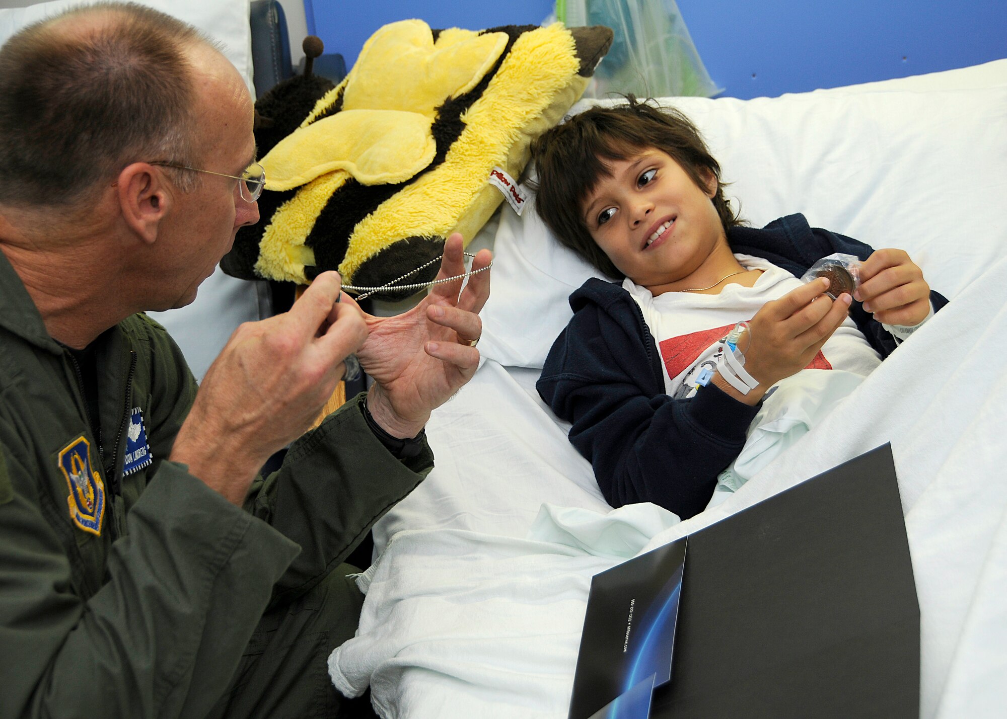Colonel Donald R. Lindberg, Homestead Air Reserve Base commander, met  children and passed out gifts while at Miami Childrens Hospital Aug. 11th and extended  personal invitation to the 2010 Wings Over Homestead Air Show. Col Lindberg was one of 28 Commanders from 10th Air Force who participated in a two day seminar on the Lean system, a managerial process designed to help identify waste, at the Homestead Air Reserve Base and Children's Hospital.
