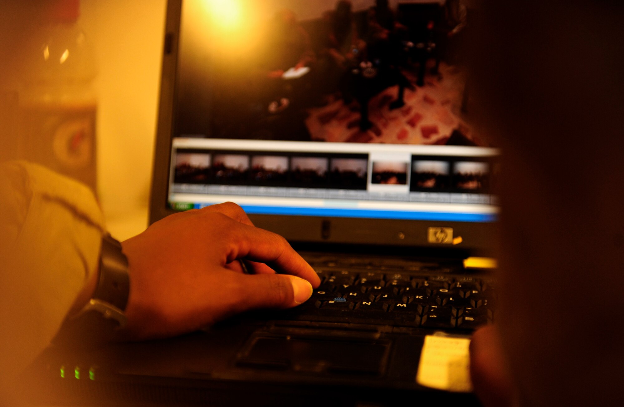 U.S. Air Force Senior Airman Asha McMakin, a combat photographer assigned to the 1st Combat Camera Squadron, edits her photos on her laptop before handing them off to the Army Civil Affairs team at Ramadi, Iraq on Aug. 2, 2010. SrA McMakin is attached to an Army Civil Affairs team while deployed in support of Operation Iraqi Freedom.
(U.S. Air Force photo by Staff Sgt. Andy M. Kin / Released)