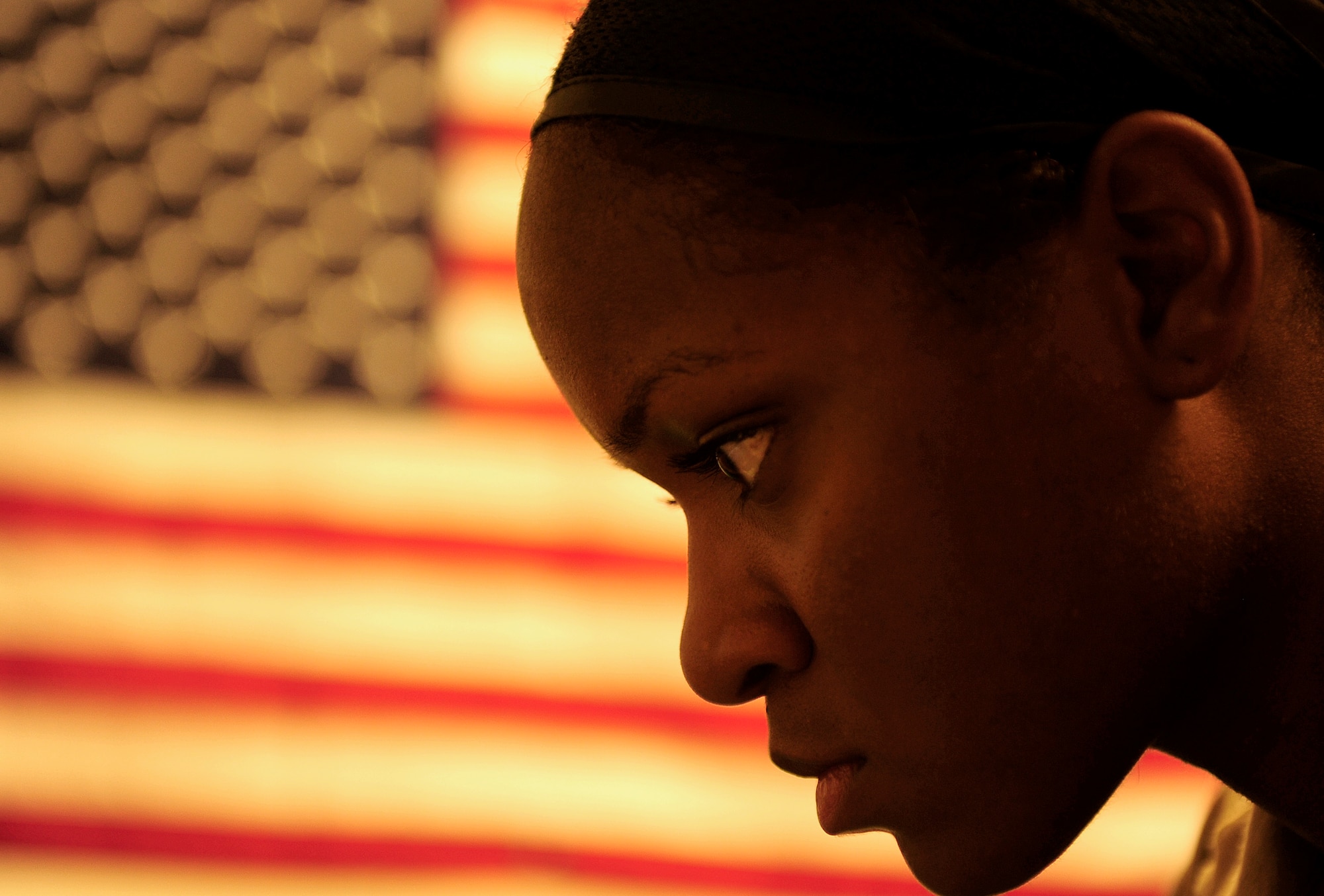 U.S. Air Force Senior Airman Asha McMakin, a combat photographer assigned to the 1st Combat Camera Squadron, sits in her room editing her imagery after mission for the Army Civil Affairs team at Ramadi, Iraq on Aug. 2, 2010. SrA McMakin is attached to an Army Civil Affairs team while deployed in support of Operation Iraqi Freedom.
(U.S. Air Force photo by Staff Sgt. Andy M. Kin / Released)
