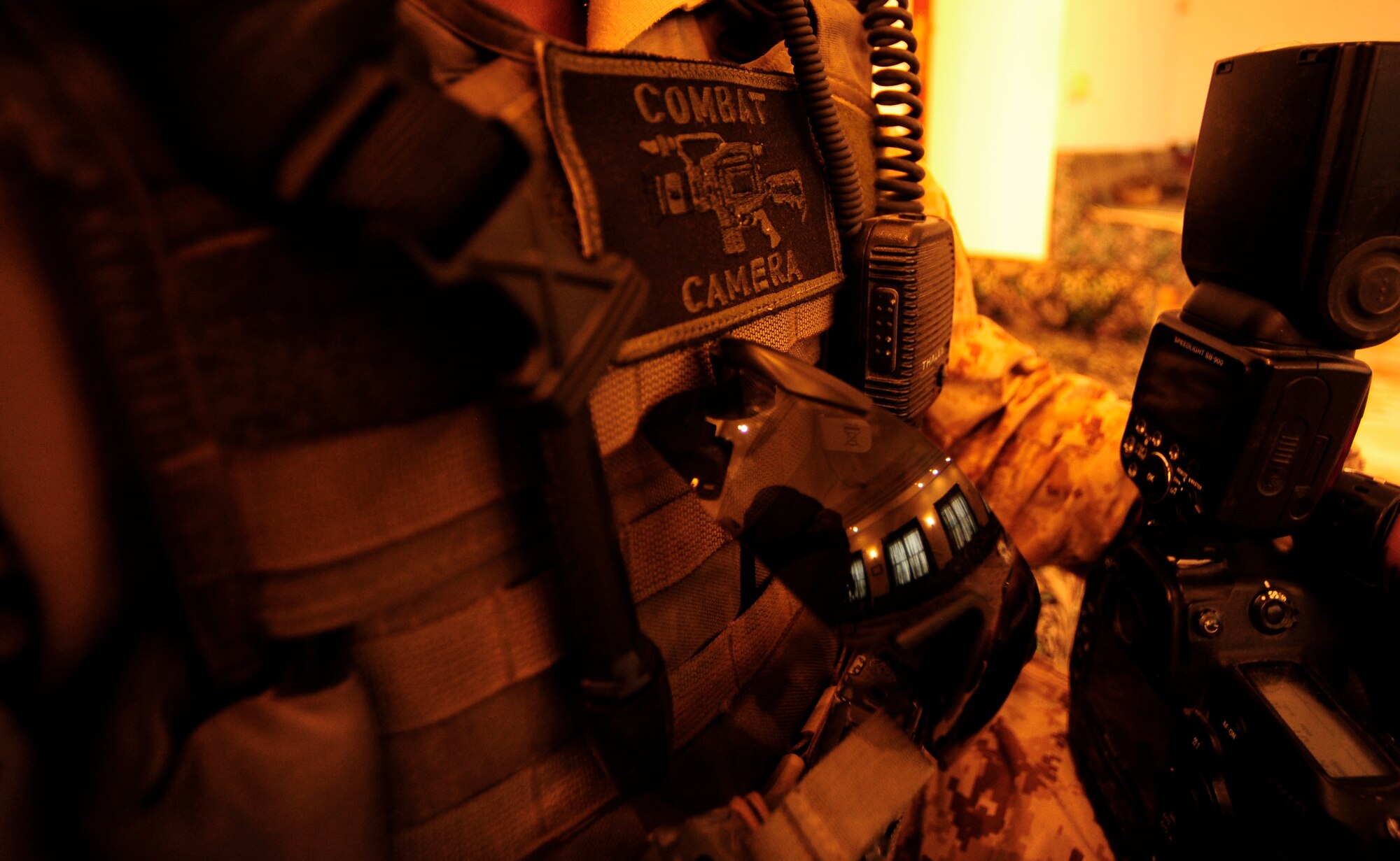 U.S. Air Force Senior Airman Asha McMakin, a combat photographer assigned to the 1st Combat Camera Squadron, documents a key leader engagement meet at Ramadi, Iraq on Aug. 2, 2010. SrA McMakin is attached to an Army Civil Affairs team while deployed in support of Operation Iraqi Freedom.
(U.S. Air Force photo by Staff Sgt. Andy M. Kin / Released)