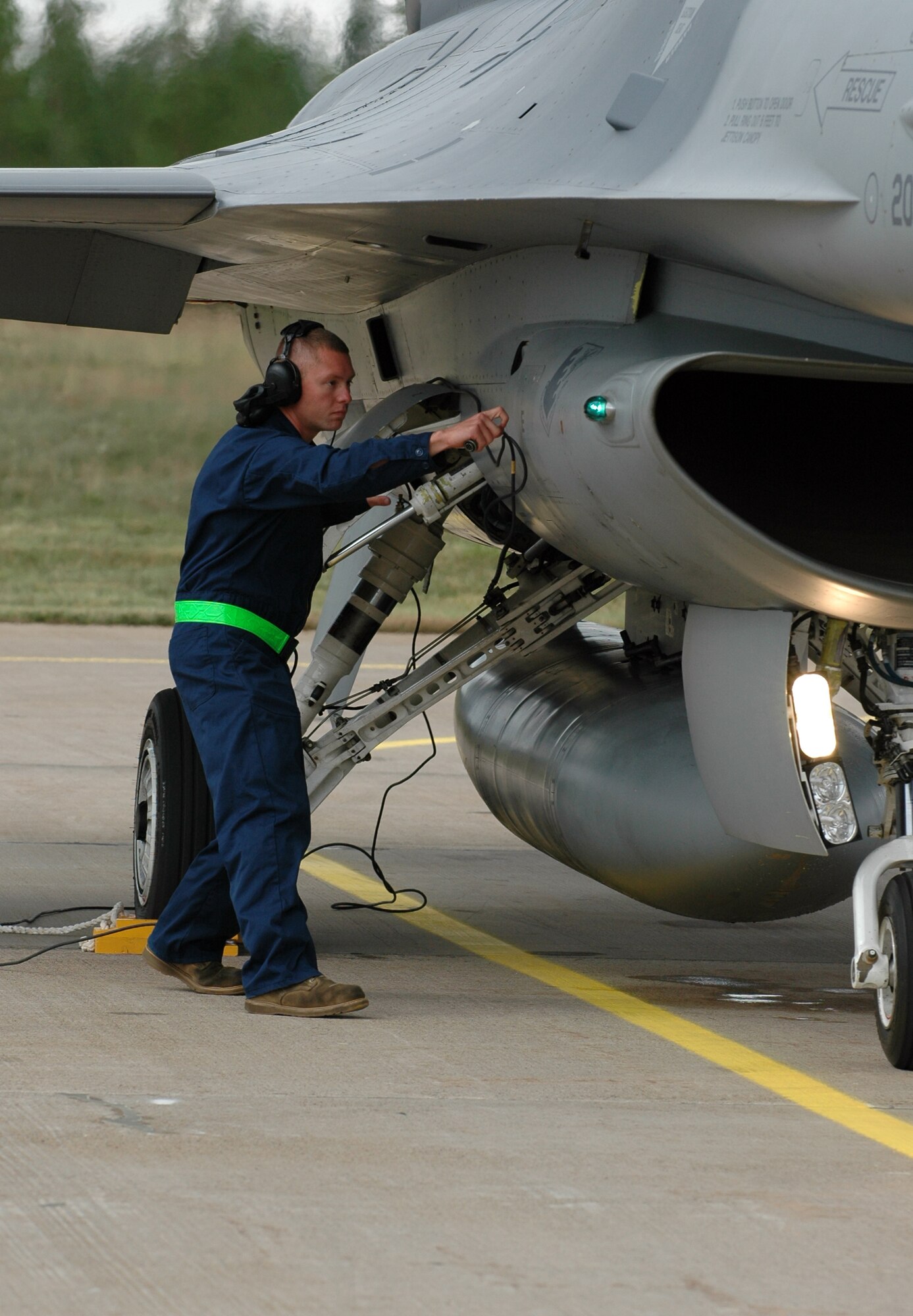 Staff Sgt. Ken Richardson, 31st Aircraft Maintenance Squadron crew chief, recovers an F-16 after an air-to-air flying mission Aug. 4, 2010 at Kallax Air Base, Sweden. More than 250 men and women from the 555th Fighter Squadron and 31st AMXS traveled to the Swedish air base on July 30, 2010 for a two week exercise conducting air-to-air and air-to-ground flying missions alongside F 21 Wing. (U.S. Air Force photo by Tech. Sgt. Lindsey Maurice/Released)
