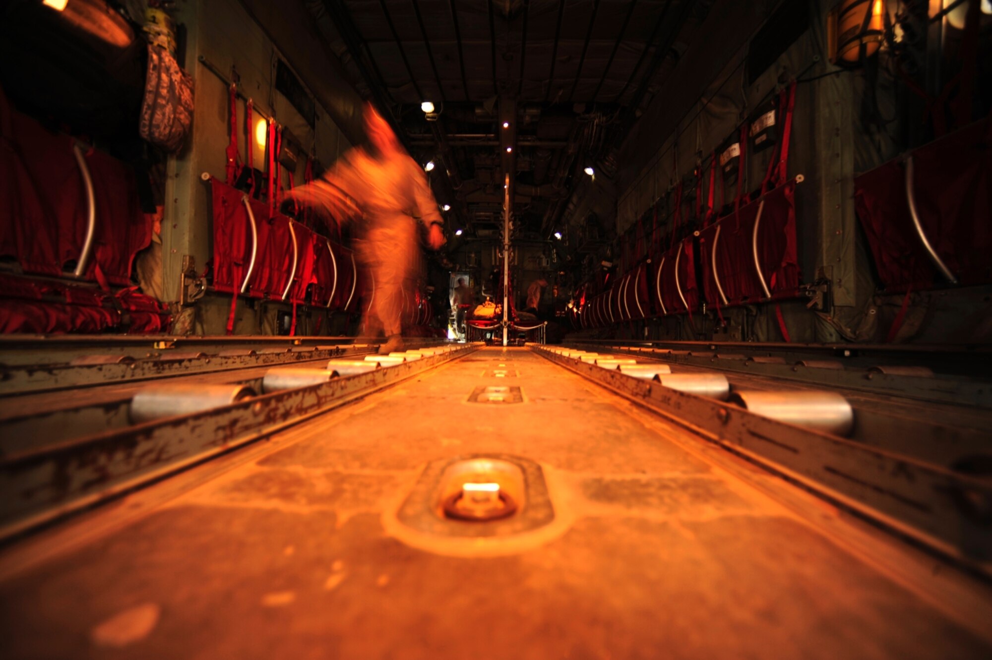 U.S. Air Force Staff Sgt. Karen Hunt a  C-130 Hercules loadmaster assigned to the 777th Expeditionary Airlift Squadron, goes through pre-flight inspections prior to flying mission at Joint Base Balad, Iraq on July 25, 2010. (U.S. Air Force photo by Staff Sgt. Andy M. Kin / Released)