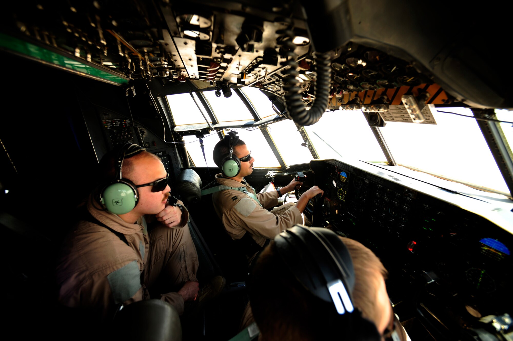 U.S. Air Force Capt. David Miller a C-130 Hercules pilot assigned to the 777th Expeditionary Airlift Squadron, flies over the skies of Iraq with crew in support of Iraqi Freedom at Joint Base Balad, Iraq on July 25, 2010.
(U.S. photo by Staff Sgt. Andy M. Kin / Released)