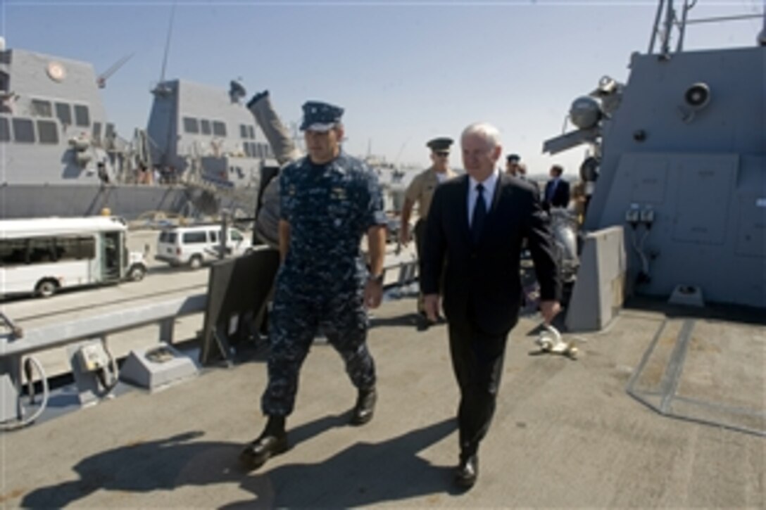 U.S. Defense Secretary Robert M. Gates tours the USS Higgins with Navy Commander Rome Ruiz in San Diego, Aug. 12, 2010. The Higgins is an Arleigh Burke-class, guided missile destroyer, named in honor of Marine Col. William R. (Rich) Higgins, who was kidnapped and murdered in 1988, while serving as the chief, Observer Group Lebanon and senior military observer, U.S. Military Observer Group, U.N. Truce Supervision Organization (Palestine). 