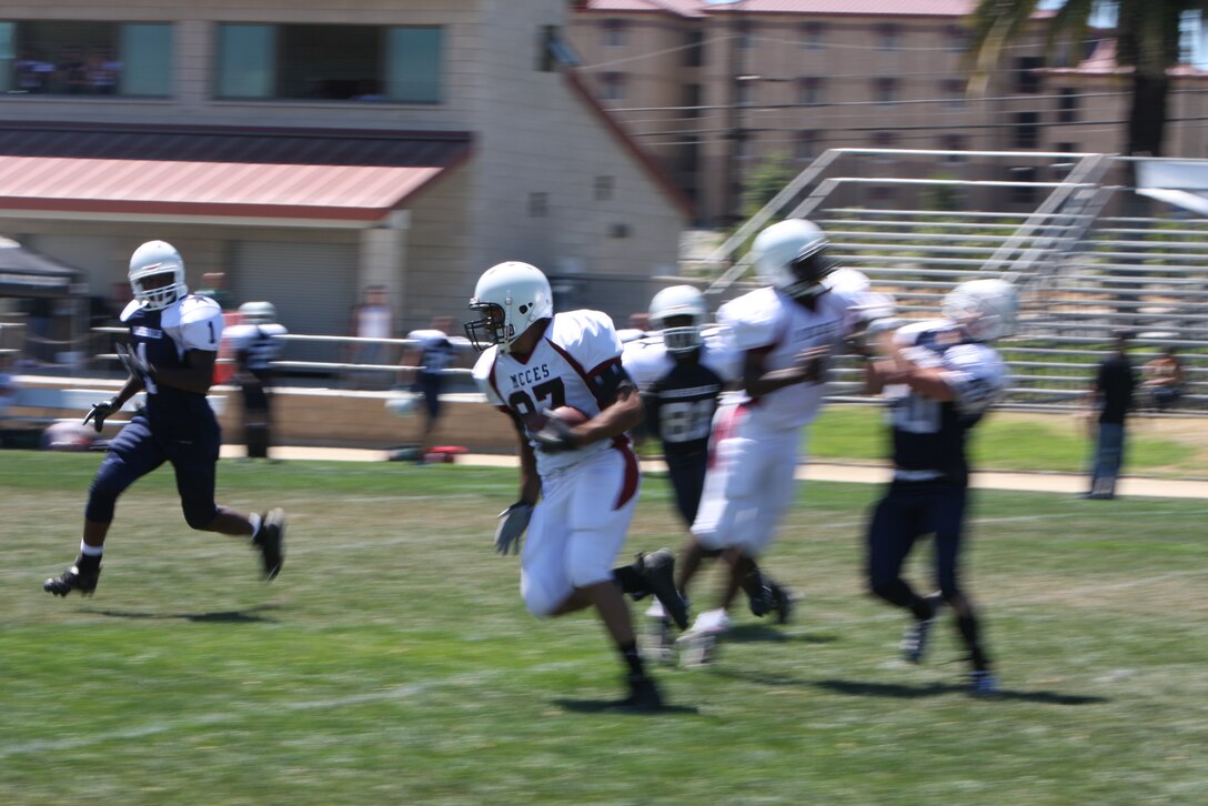 MARINE CORPS AIR GROUND COMBAT CENTER TWENTYNINE PALMS, Calif. – A convoy of Marine Corps Communication-Electronics School Mustangs left Aug. 14 for Marine Corps Base Camp Pendleton, Calif., ready to kick-off their first preseason football game against the School of Infantry’s Marshals.