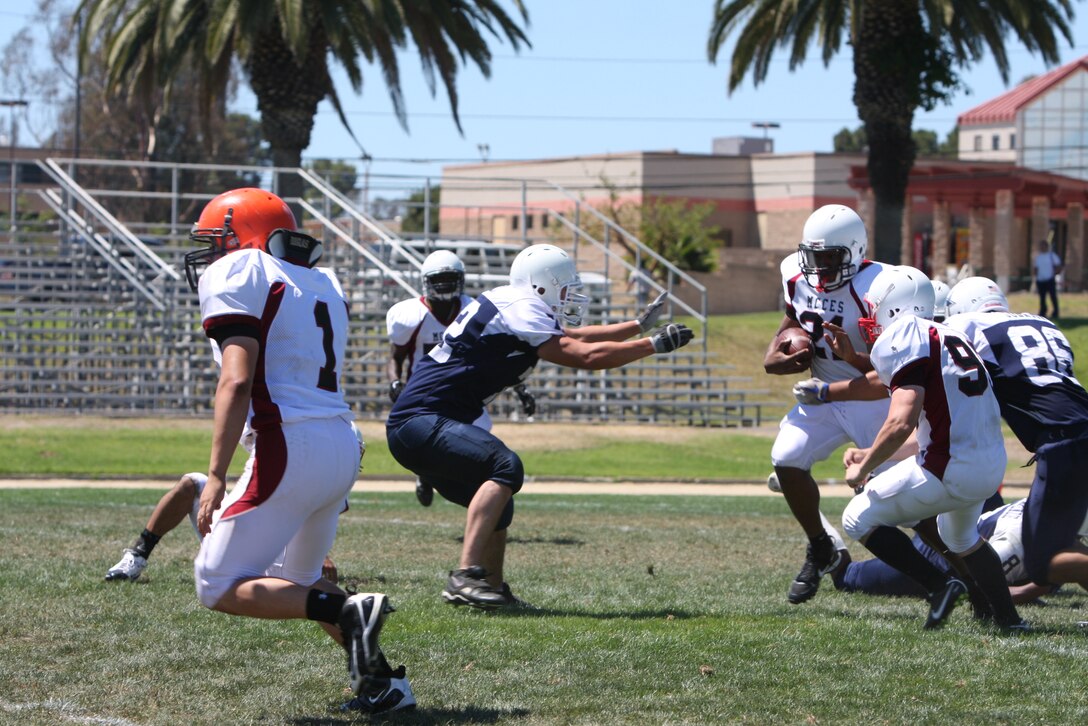 MARINE CORPS AIR GROUND COMBAT CENTER TWENTYNINE PALMS, Calif. – A convoy of Marine Corps Communication-Electronics School Mustangs left Aug. 14 for Marine Corps Base Camp Pendleton, Calif., ready to kick-off their first preseason football game against the School of Infantry’s Marshals.