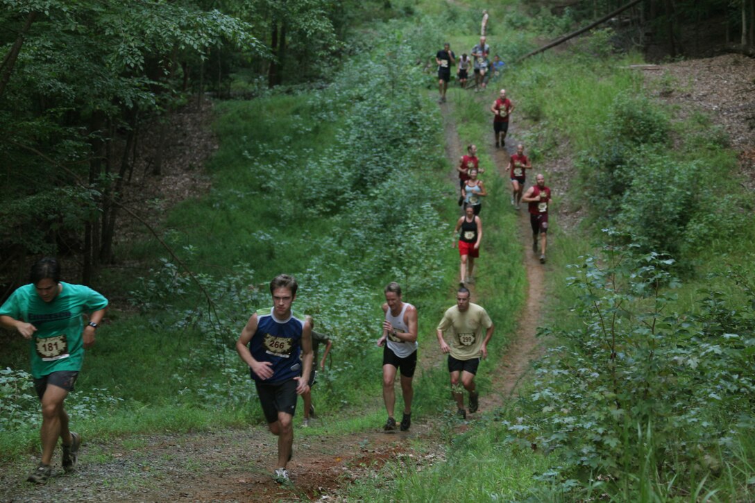 Run Amuck racers charge the hills of Marine Corps Base Quantico, Va., Aug. 14, 2010. The race drew 2,130 runners, who climbed walls, crawled through pipes and slogged across mud pits, all while running the 3.5 mile course.