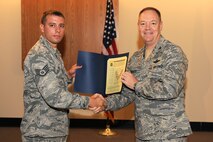 Colonel Kevin W. Bradley, 174th Fighter Wing Commander presides over the NCO/SrNCO Induction ceremony during the August 2010 UTA at Hancock Field. 
(US Air Force Photo by: Staff Sgt James N. Faso II/ Released)
