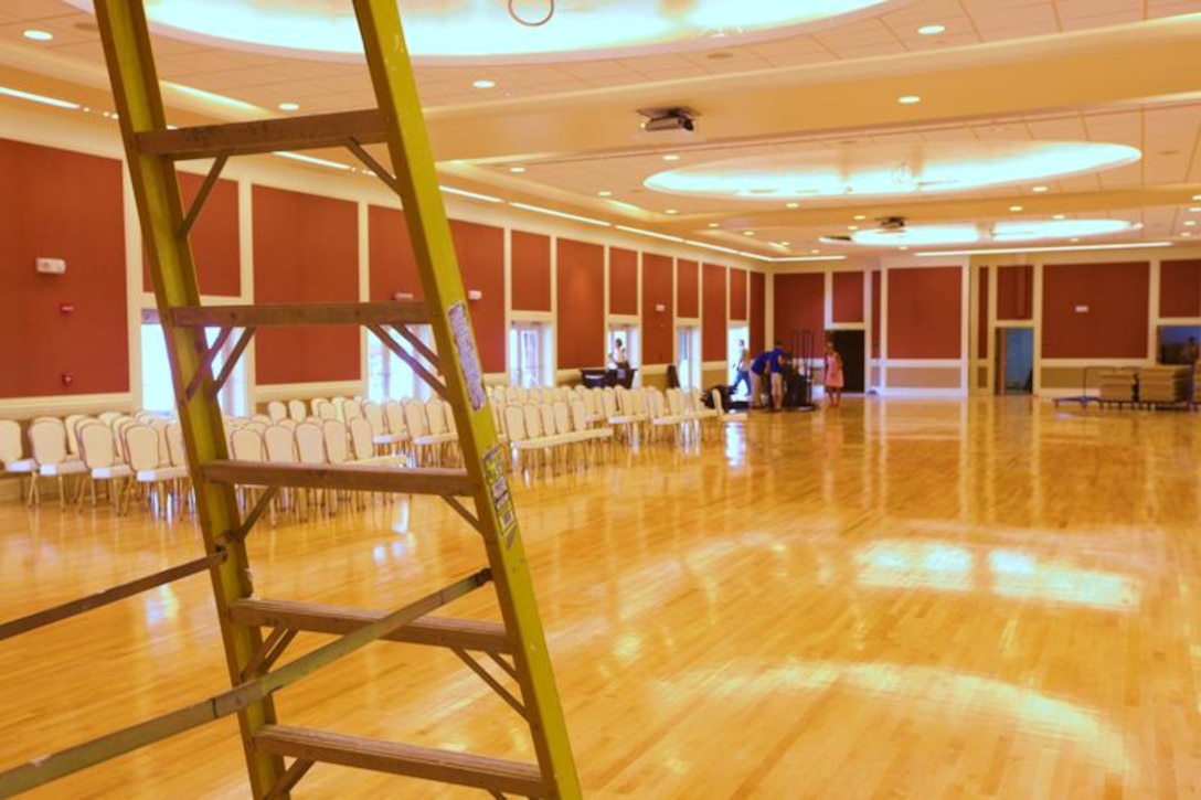 Employees with Marine Corps Community Services help bring new chairs and tables into the Tinian ballroom during a renovation project of Marston Pavilion aboard Marine Corps Base Camp Lejeune, recently. The renovation project began in early January and will better suit catering needs and events held by personnel aboard the base. (Official U.S. Marine Corps photo by Lance Cpl. Damany S. Coleman)