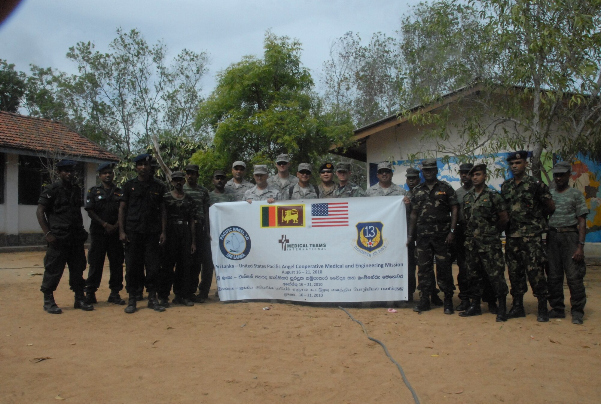 U.S. Air Force and Sri Lankan Army civil engineers meet during a school refurbishment project in Puttalam Township, Sri Lanka, as part of Pacific Angel-Sri Lanka on Aug. 16, 2010. Operation Pacific Angel is a joint and combined humanitarian assistance operation conducted in the Pacific area of responsibility to support U.S. Pacific Command's capacity-building efforts. This humanitarian and civic assistance program is aimed at improving military civic cooperation between the United States and countries throughout the Asia-Pacific region. Pacific Angel 2010 is scheduled through August 22. (U.S. Air Force photo/ Master Sgt. Mike Hammond)