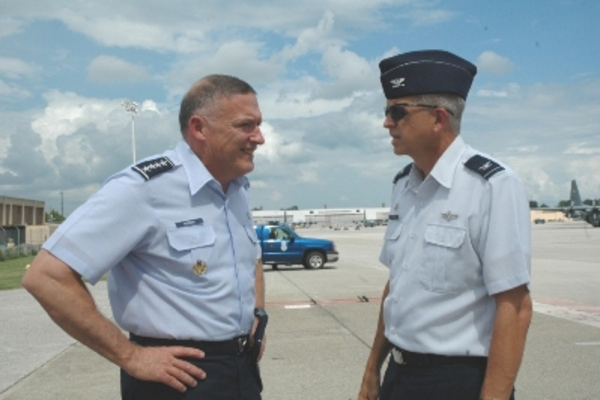 Gen. Gary North, Pacific Air Forces commander , talks with Col. Timothy Tarchick, 94th Airlift Wing and Dobbins Air Reserve Base commander, during the general’s visit to the Atlanta area Aug. 16.  (U.S. Air Force photo/J.D. Marckmann)


