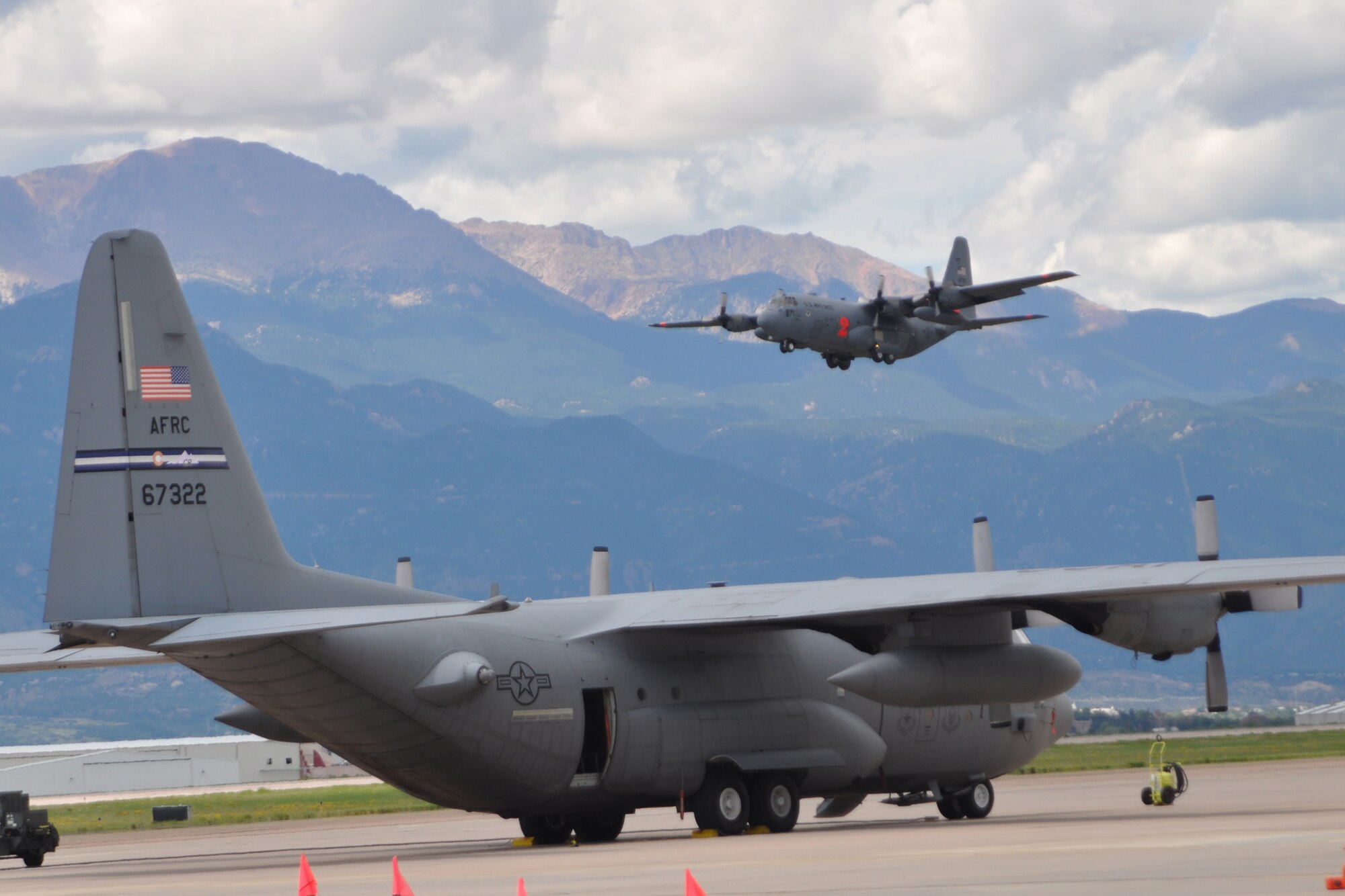 Col. Bob Chapman pilots a 302nd Airlift Wing C-130 Hercules on final approach Aug. 8 at Peterson Air Force Base, Colo. This was the colonel's final flight with the 302nd AW, which culminated his military flying career of more than 5,200 hours of flight, including over combat zones. Colonel Chapman, who relinquished his position as the wing's vice commander during the August unit training assembly, has served in the Air Force since 1978 when he joined as an enlisted member. The colonel left Active Duty in 1992, becoming an Air Force Reserve member with the 302nd AW. The colonel is projected to retire in March 2011. (U.S.  Air Force photo/Ann Skarban)