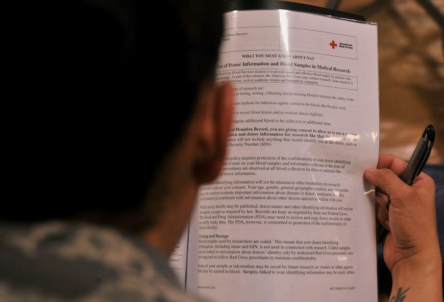 MOODY AIR FORCE BASE, Ga. -- An Airman reads a pamphlet prior to donating blood to the American Red Cross here Aug. 12. The pamphlet contains information on the donation process and other information regarding the decision to donate. (U.S. Air Force photo by Airman 1st Class Joshua Green/RELEASED)