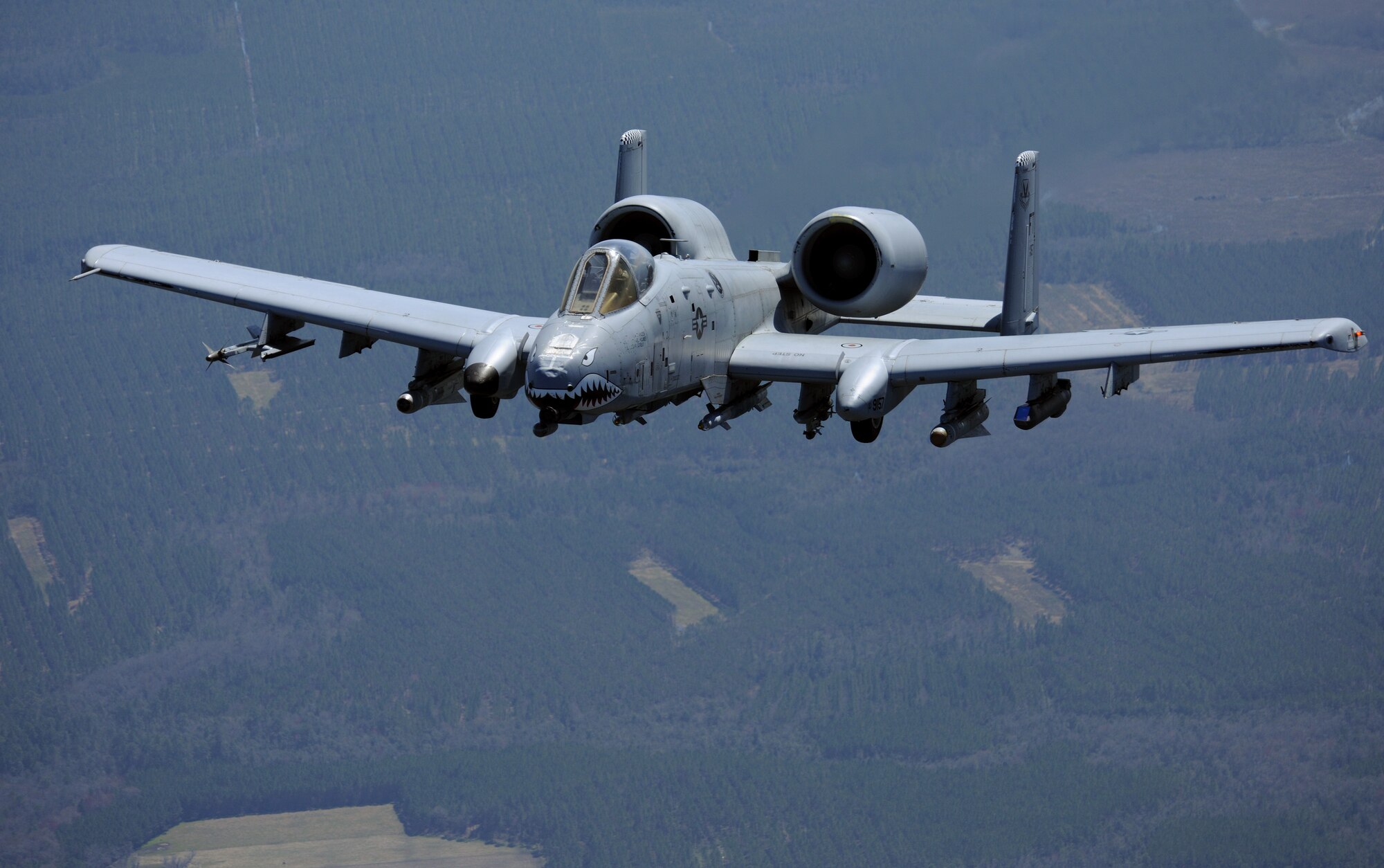 MOODY AIR FORCE BA SE, Ga. -- An A-10C Thunderbolt II returns to flight formation after exercising  evasive maneuvering techniques during training here March 16. Moody A-10Cs will provide close air support to U.S. Marine Corps and U.S. Navy forces during the three-week Enhanced Mojave Viper Exercise in Arizona.. (U.S. Air Force photo by Airman 1st Class Benjamin Wiseman/RELEASED)