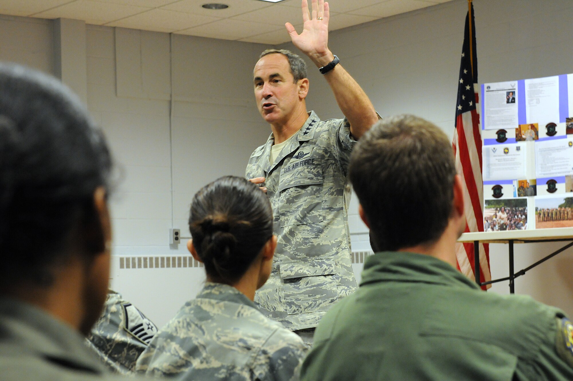 JOINT BASE ANDREWS, Md. -- Gen. Raymond E. Johns Jr., Air Mobility Command commander, speaks to Airmen from the 459th Aeromedical Evacuation Squadron, the 459th Aerospace Medicine Squadron and the 459th Aeromedical Staging Squadron during the Unit Training Assembly while visitng the 459th Air Refueling Wing here Aug. 14. As he spoke to the various squadrons, he thanked the 459th ARW Reserve Airmen for their contributions to AMC partners and to the regular Air Force. (U.S. Air Force photo/Tech Sgt. Steve Lewis)   