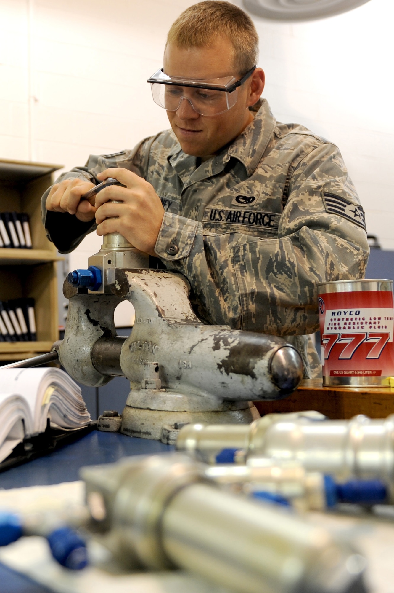 Staff Sgt. Michael Mahaney, 906th Air Refueling Squadron, overhauls a hydraulic filter assembly for a KC-135 Stratotanker at Scott AFB, July 20, 2010. Replacing the dirty filters ensures clean hydraulic fluid runs through the system on the KC-135. Sergeant Mahaney is an active duty member working alongside the Air National Guard of the 126th Air Refueling Wing as part of joint effort between active and guard units to keep the KC-135?s flying. (U.S. Air Force photo by Staff Sgt. Brian J. Ellis)