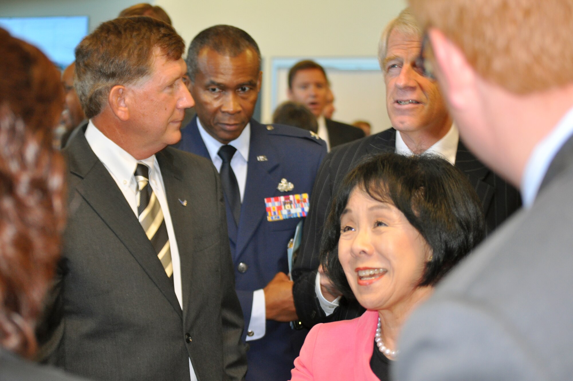 Terry Yonkers (left), assistant secretary of the Air Force for installations, environment and logistics and California Congresswoman Doris Matsui greet community officials Aug. 12, 2010, following a ceremony to transfer some 560 acres of the former McClellan Air Force Base in Sacramento, Calif., to the McClellan Business Park to provide space for a variety of industrial facilities, office buildings, a hotel and housing.  (U.S. Air Force photo)