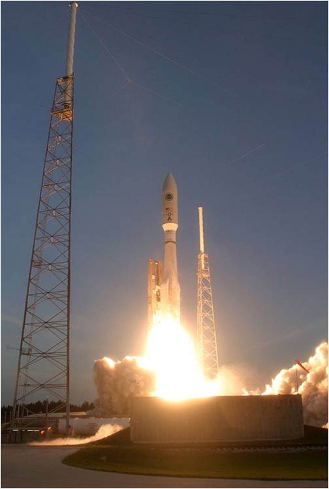A United Launch Alliance Atlas V Rocket with the Air Force's Advanced Extremely High Frequency - 1 (AEHF-1) satellite launches from the Space Launch Complex-41 launch pad at 7:07 a.m. EDT today. The AEHF constellation of satellites will provide 10 times greater capacity and channel data rates 6 times higher than that of the existing Milstar II communications satellites. (Photo by Ben Cooper, Space Flight Now)
