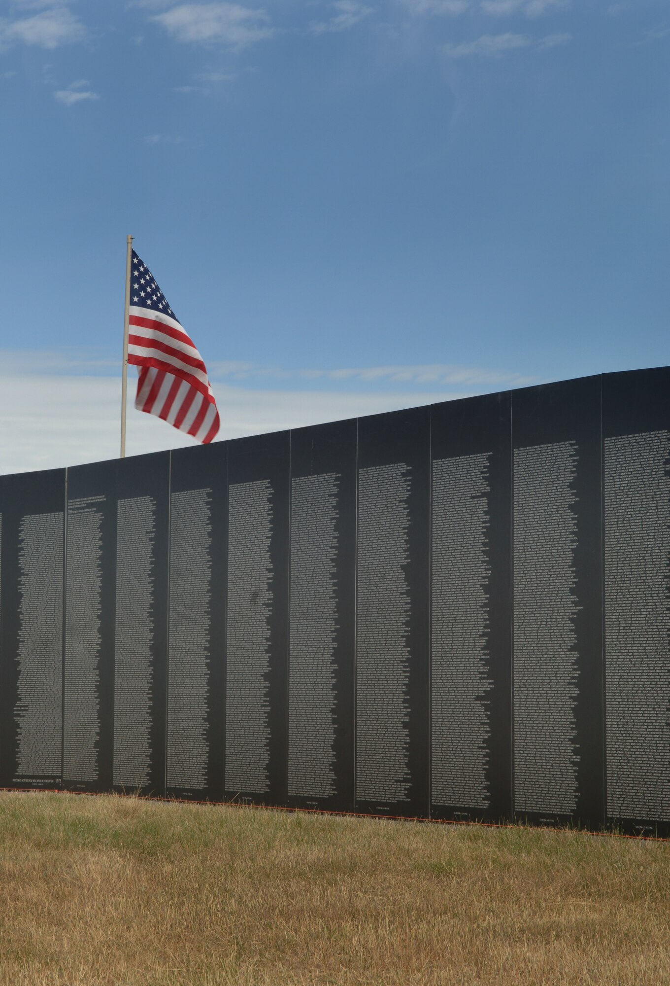 ELLSWORTH AIR FORCE, S.D. – The traveling wall stands for the first time at the Buffalo Chip, Sturgis, S.D.  The wall is 80 percent the size of the original Vietnam Memorial Wall in Washington, D.C. and includes all of the names of the original.  (U.S. Air Force photo/Airman 1st Class Alessandra N. Hurley)