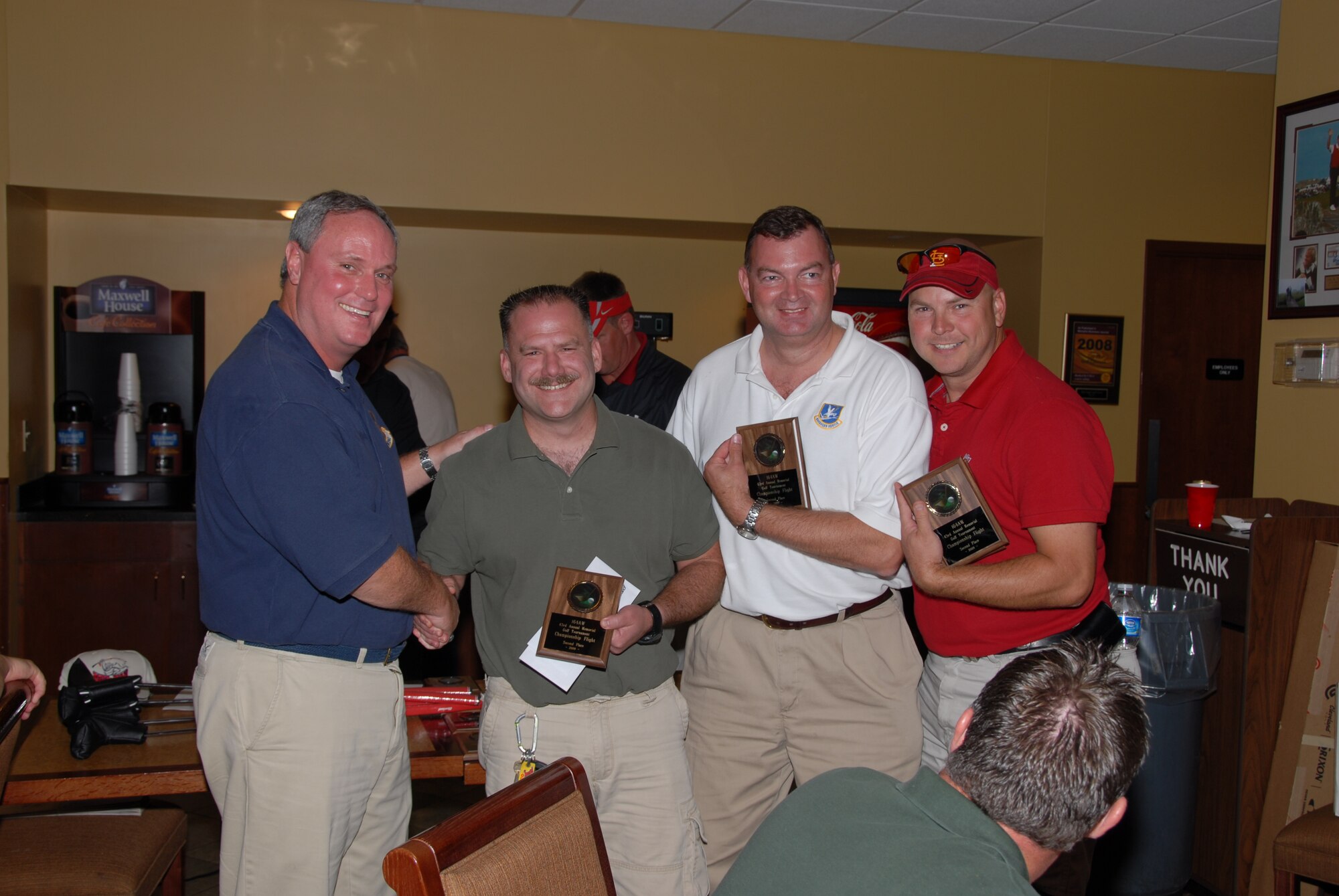 Colonel Montgomery presents awards at last years golf tournament.