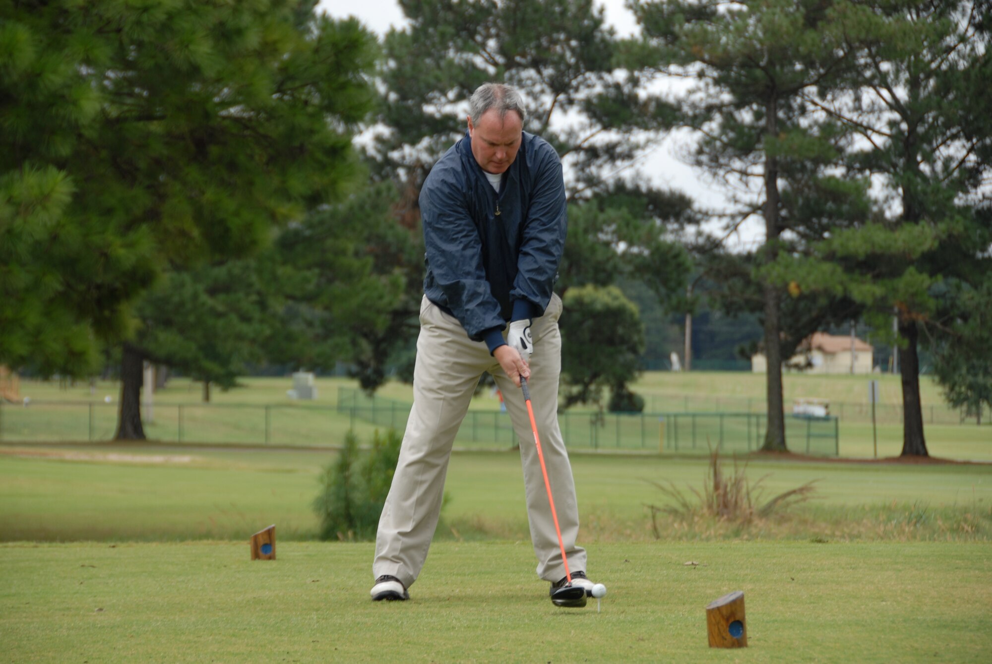 Colonel Harry Montgomery, 164th Airlift Wing Commander, prepares to tee off at last years golf tournament.