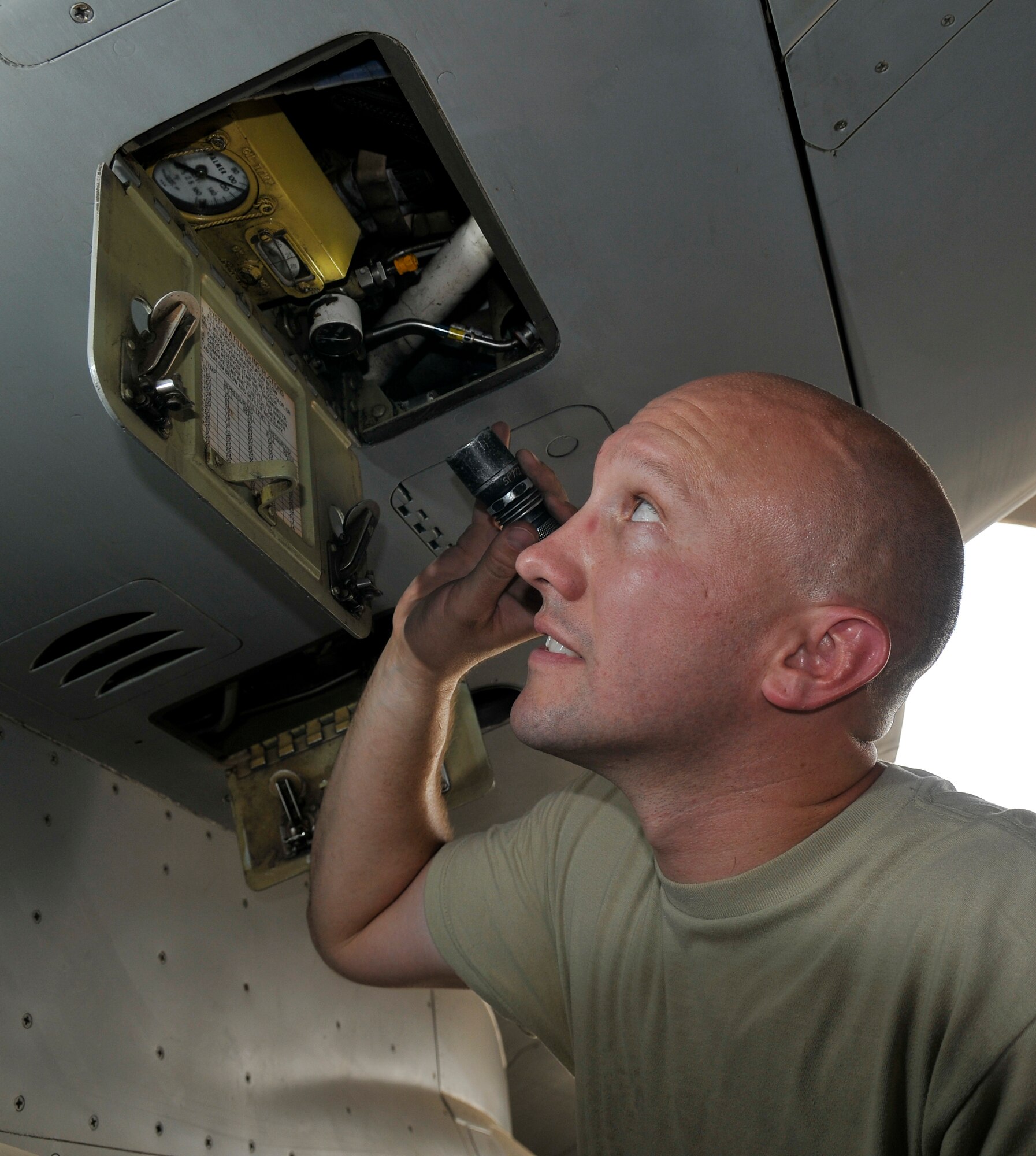 Master Sgt. Jesse Mathes, 332nd Expeditionary Aircraft Maintenance Squadron Viper Aircraft Maintenance Unit production superintendant, checks a hydraulic pressure gauge on an F-16 Fighting Falcon during an exceptional release inspection Aug. 6, 2010, Joint Base Balad, Iraq. JBB’s F-16’s perform demanding missions for long hours; being mechanically sound is crucial for mission success. Sergeant Mathes, a native of Gate City, Va., is deployed from Shaw Air Force Base, S.C. (U.S. Air Force photo/staff Sgt. Phillip Butterfield)