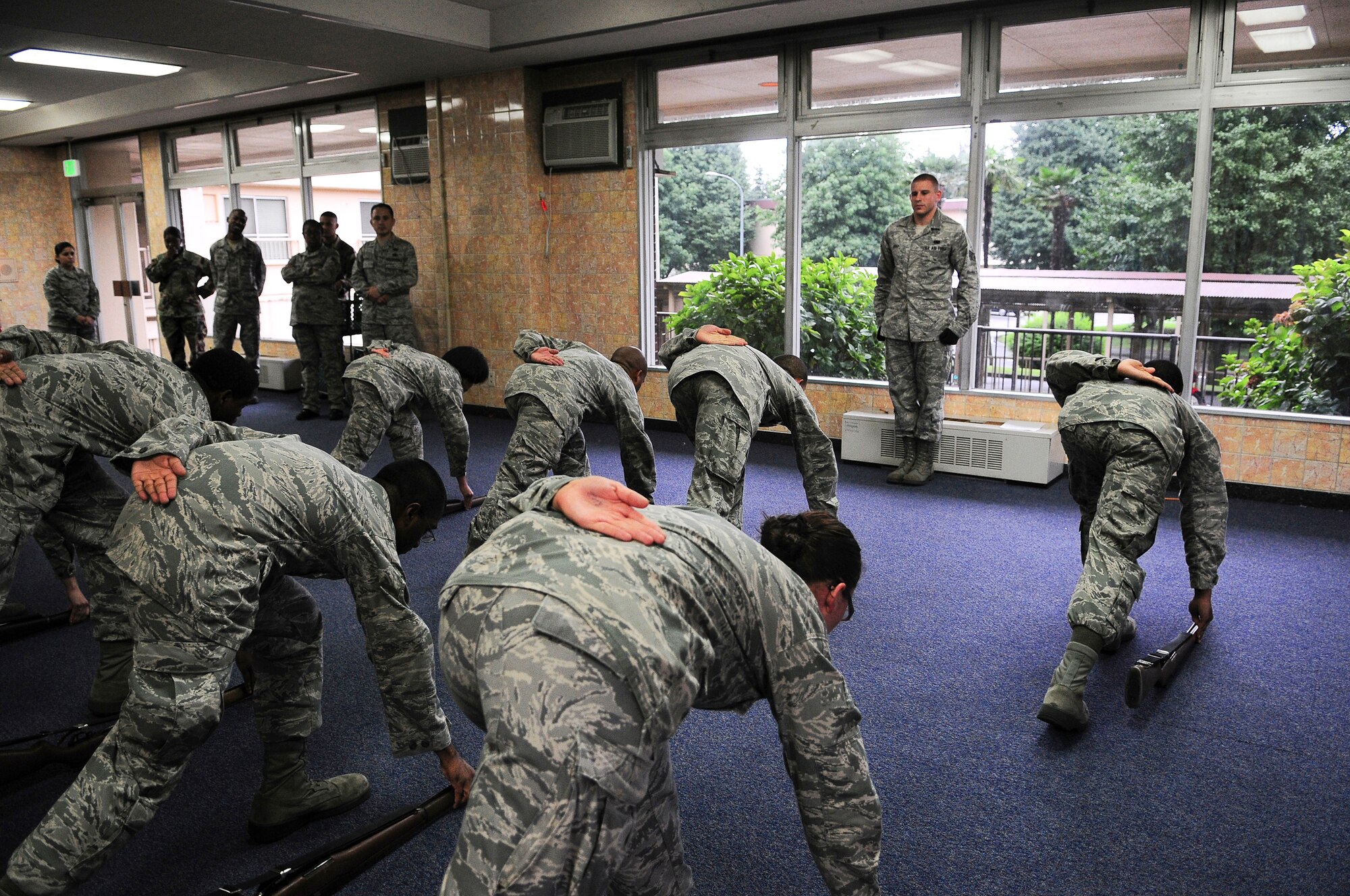 YOKOTA AIR BASE, Japan -- Airmen participate in a week-long seminar held by the Yokota Honor Guard to determine if they have what it takes to becoming a Ceremonial Guardsmen. After hours of training and practice the recruits have to pass a rigorous evaluation in order to receive a 13 month contract with the honor guard. They will be responsible for performing in a multitude of military ceremonies to include: Changes of Command, Promotion Ceremonies, Retirement Ceremonies, and at times, military cordons and balls. (U.S. Air Force photo by Staff Sgt Stacy Moless)    