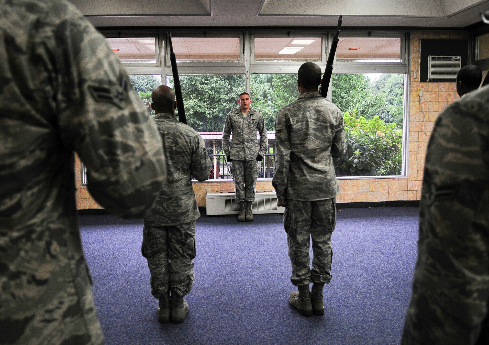 YOKOTA AIR BASE, Japan -- Airmen participate in a week-long seminar held by the Yokota Honor Guard to determine if they have what it takes to becoming a Ceremonial Guardsmen. After hours of training and practice the recruits have to pass a rigorous evaluation in order to receive a 13 month contract with the honor guard. They will be responsible for performing in a multitude of military ceremonies to include: Changes of Command, Promotion Ceremonies, Retirement Ceremonies, and at times, military cordons and balls. (U.S. Air Force photo by Staff Sgt Stacy Moless)    