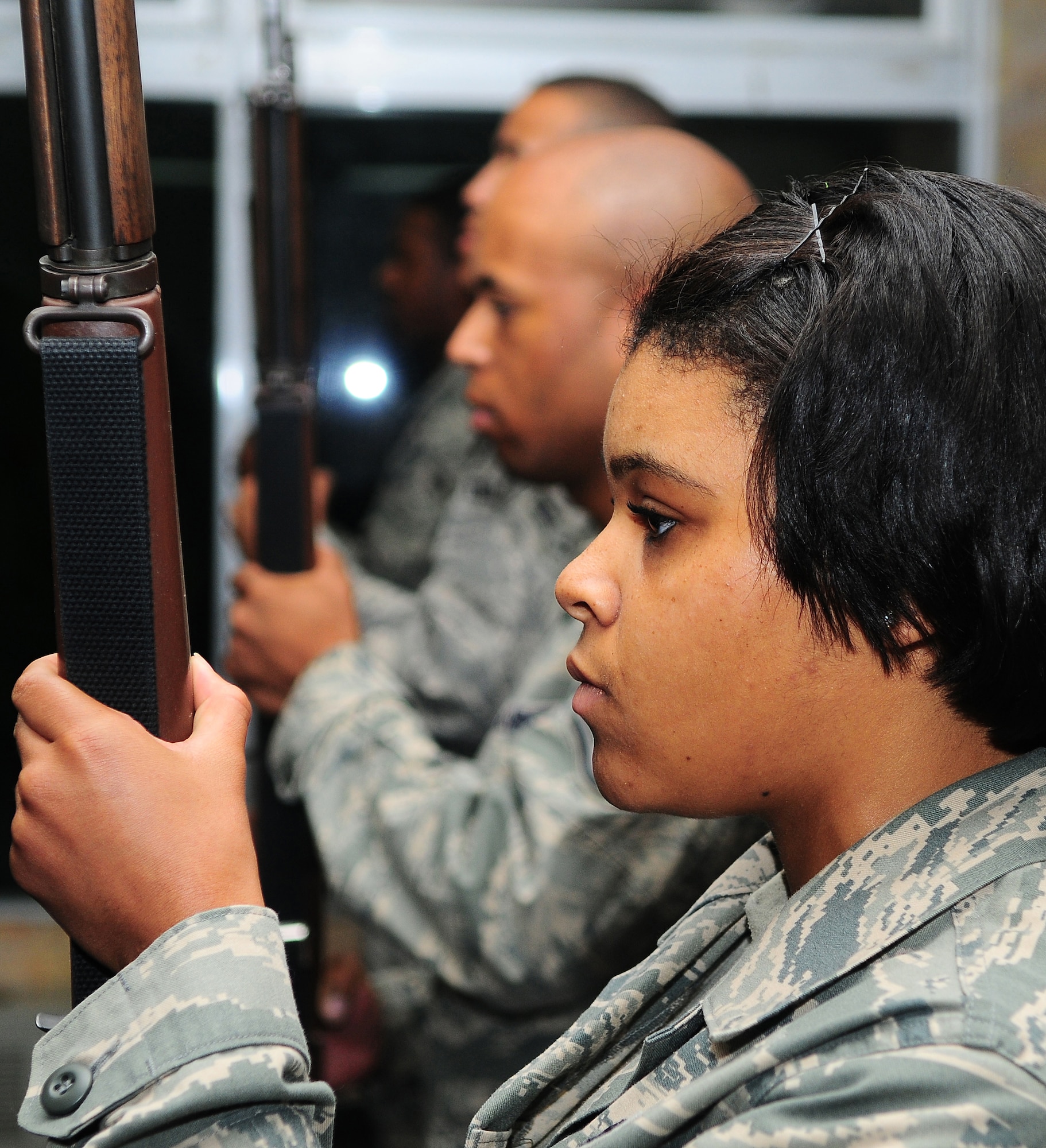 YOKOTA AIR BASE, Japan -- Airmen 1st Class Kayla Ferrell, 374th Logistics Readiness Squadron  participates in a week-long seminar held by the Yokota Honor Guard to determine if she has what it takes to becoming a Ceremonial Guardsmen. After hours of training and practice the recruits have to pass a rigorous evaluation in order to receive a 13 month contract with the honor guard. They will be responsible for performing in a multitude of military ceremonies to include: Changes of Command, Promotion Ceremonies, Retirement Ceremonies, and at times, military cordons and balls. (U.S. Air Force photo by Staff Sgt Stacy Moless)    