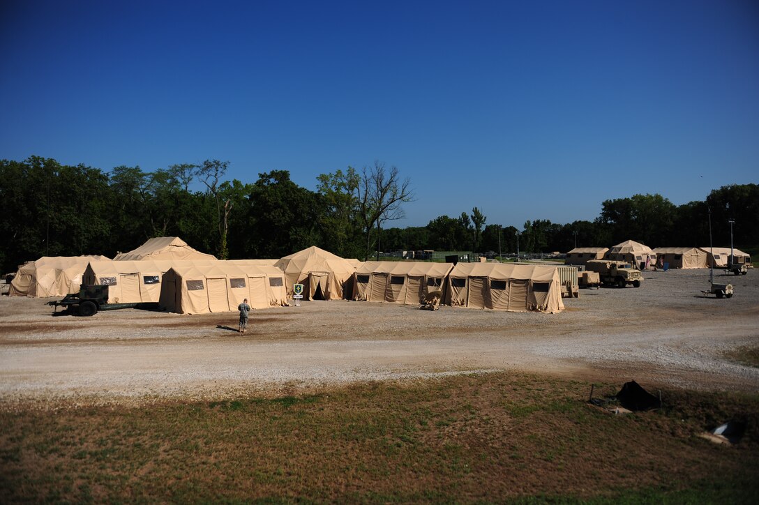 The Tactical Operations Center houses the Task Force Operations whose mission is to deploy and establish the brigade task force at a designated location within the U.S.  Northern Command Joint Operations Area on Fort Leavenworth, Kan., Aug. 14, 2010. These efforts are in support of Vibrant Response Command Post Exercise 11.1. Vibrant Response is a Northern Command training event for the Consequence Management Response Force whose mission is to save lives, prevent further injury and provide temporary critical support to enable community recovery.