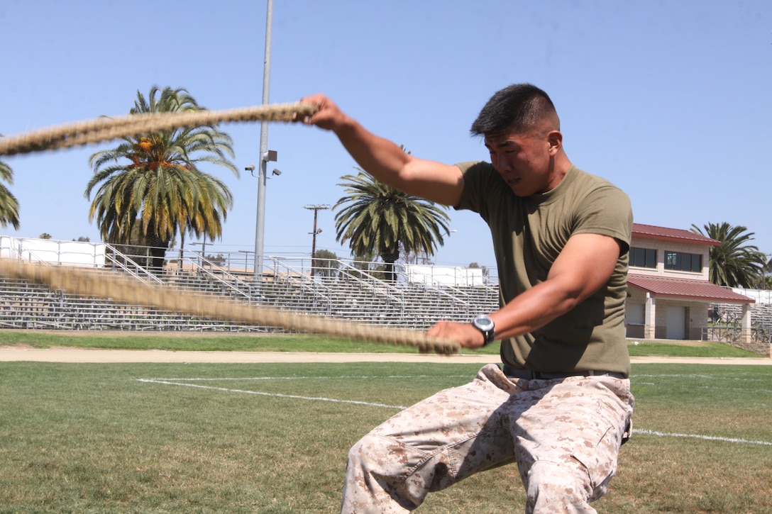 Lance Cpl. Simon Kim, rifleman, 4th Light Armored Reconnaissance Battalion, 4th Marine Division, is training for the Combat Fitness Test by conducting a combat conditioning course at Camp Pendleton’s Paige Fieldhouse, Aug. 16. The Physical Fitness Test and the CFT are the two tests used by the Marine Corps to evaluate Marines’ physical readiness.