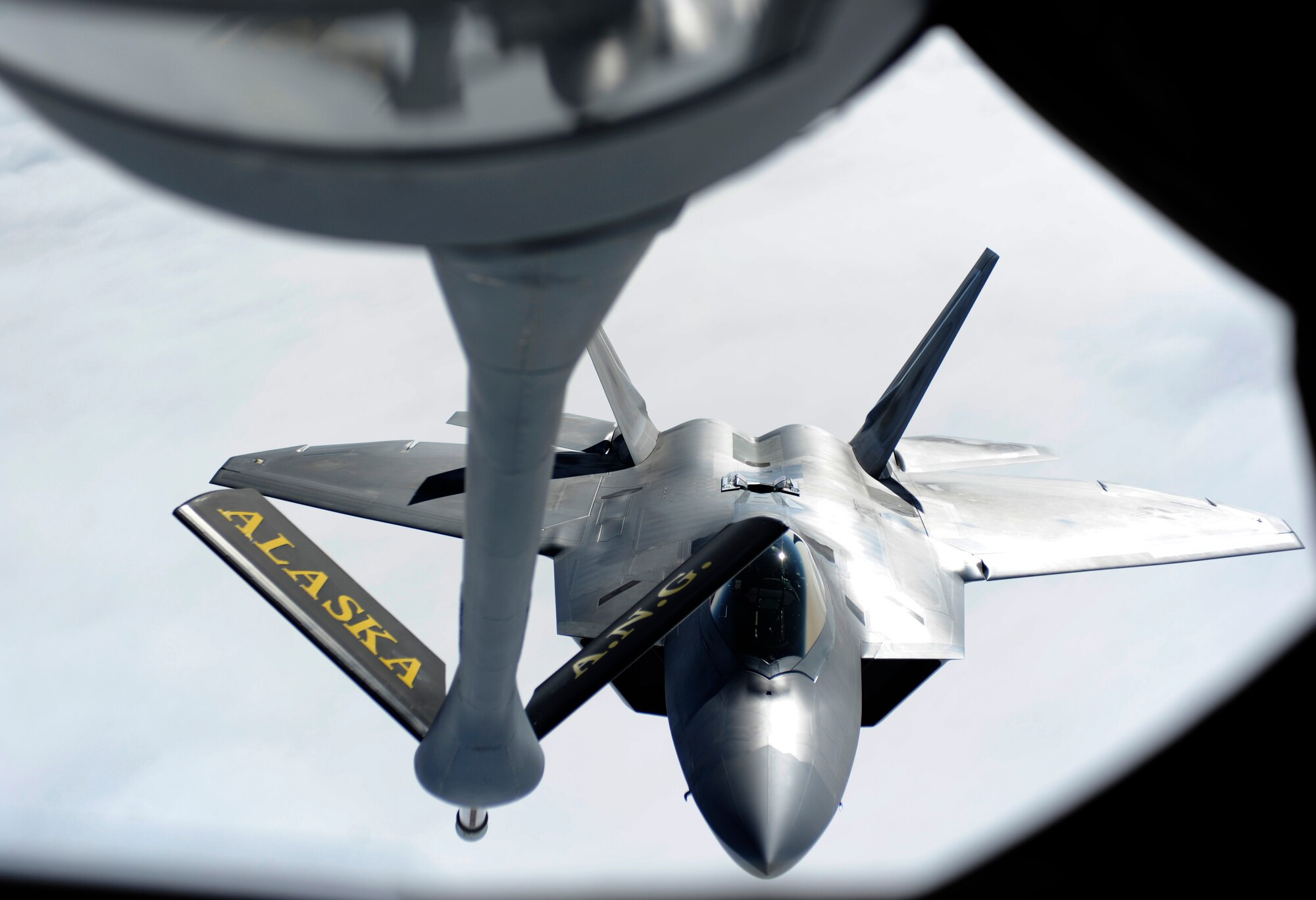 An F-22 Raptor prepares to refuel August 11, 2010, Eielson Air Force Base, Alaska. The 168th Air Refueling Wing at Eielson plays a big role in the Red Flag-Alaska mission. KC-135 Stratotankers are essentially flying gas stations and can refuel their friendly forces to keep them in the fight. (U.S. Air Force photo/Senior Airman Willard E. Grande II)