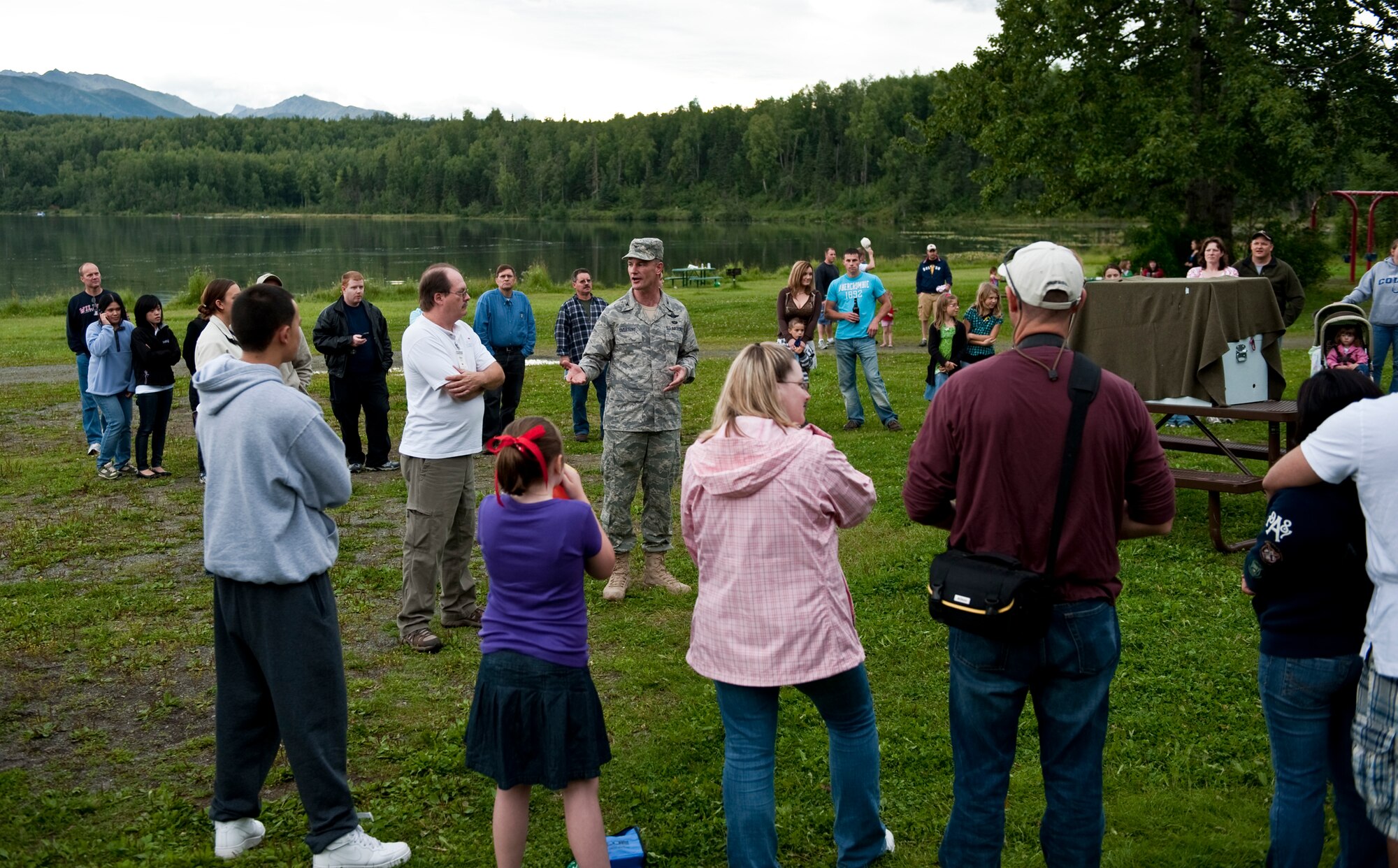 JOINT BASE ELMENDORF-RICHARDSON, Alaska – Col. Eric Overturf, 477th Fighter Group commander, talks to the crowd about an American Bald Eagle he is set to release back into the wild, Aug. 15. (Photo by Airman 1st Class Christopher Gross/JBER PAO)