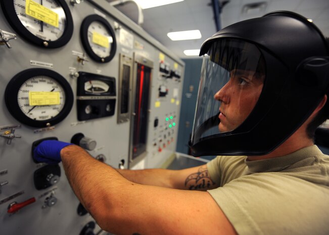 Airman 1st Class Corey Moreau performs an operational check on a main landing gear retract actuator at the hydraulics shop Aug. 17, 2010, on Joint Base Charleston, S.C. The hydraulics shop rebuilds damaged parts and tests their integrity before sending them back to be used in aircraft. The hydraulics shop also perform inspections on aircraft to help identify parts that are damaged or close to failure. Airman Moreau is an aircraft hydraulics journeyman with the 437th Maintenance Squadron. (U.S. Air Force photo/Senior Airman Timothy Taylor)