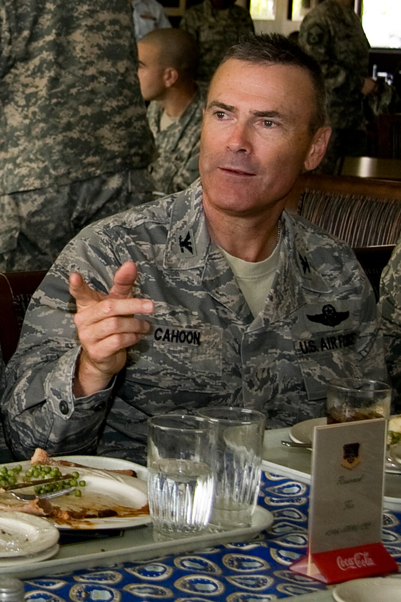 GRISSOM AIR RESERVE BASE, Ind. -- Col. William T. "Tim" Cahoon, 434th Air Refueling Wing commander, asks an Airman why she joined the Air Force Reserve as an maintainer during a luncheon held Aug. 7. Colonel Cahoon will host a luncheon with a different group of Airmen each unit training assembly. (U.S. Air Force photo/Tech. Sgt. Mark R. W. Orders-Woempner)