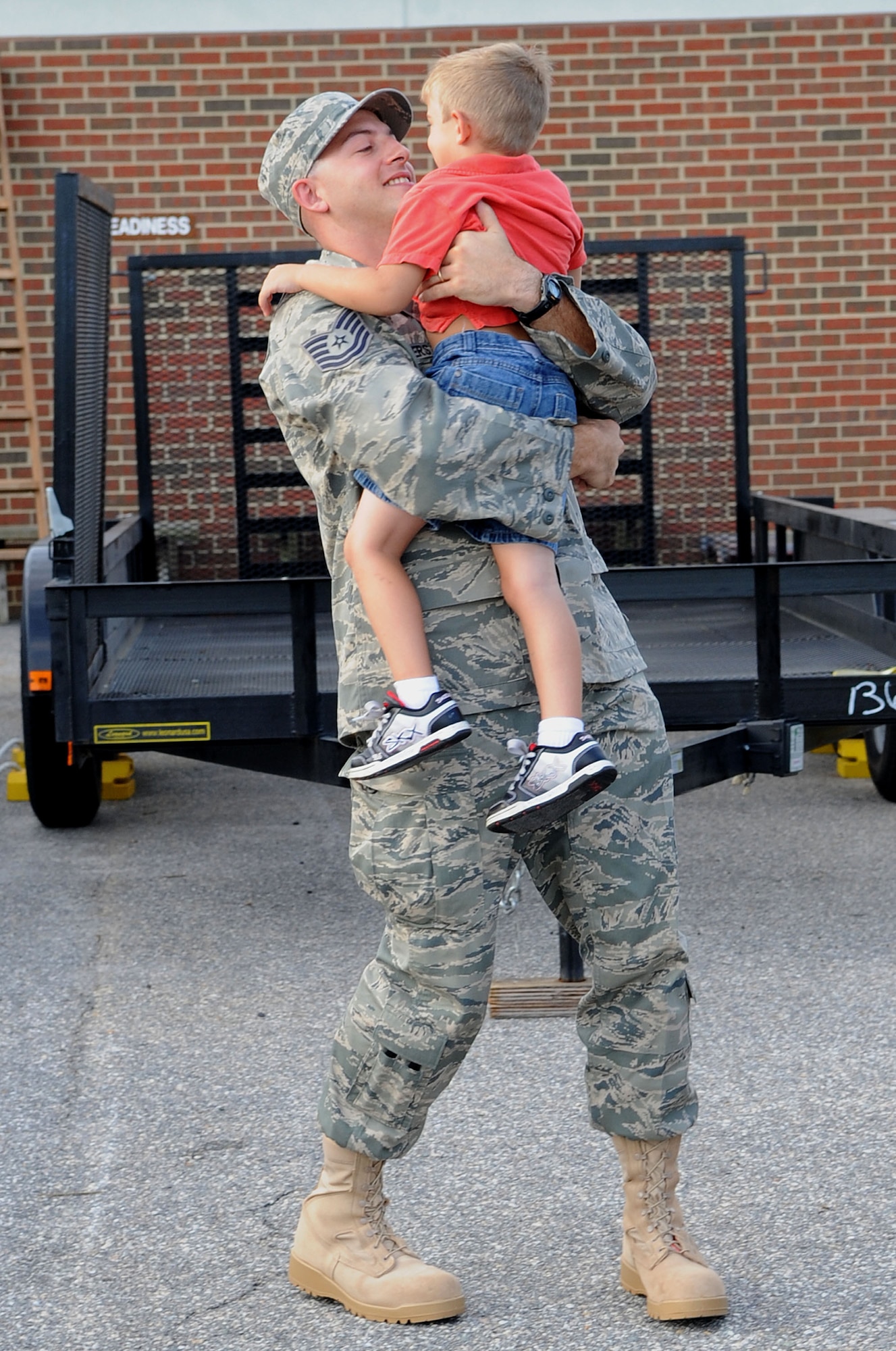 LANGLEY AIRE FORCE BASE, Va. -- Tech. Sgt. Bryan Beers, 633d Civil Engineer Squadron structures specialist, spends time with his son, Micah, before departing on his deployment to Afghanistan.  Sgt. Beers other CE professionals are part of the 877th Expeditionary Prime Base Engineer Emergency Force Squadron, tasked with the construction of forward operating bases for U.S. Central Command.  (U.S. Air Force Photo/Staff Sgt. Christina M. Styer)