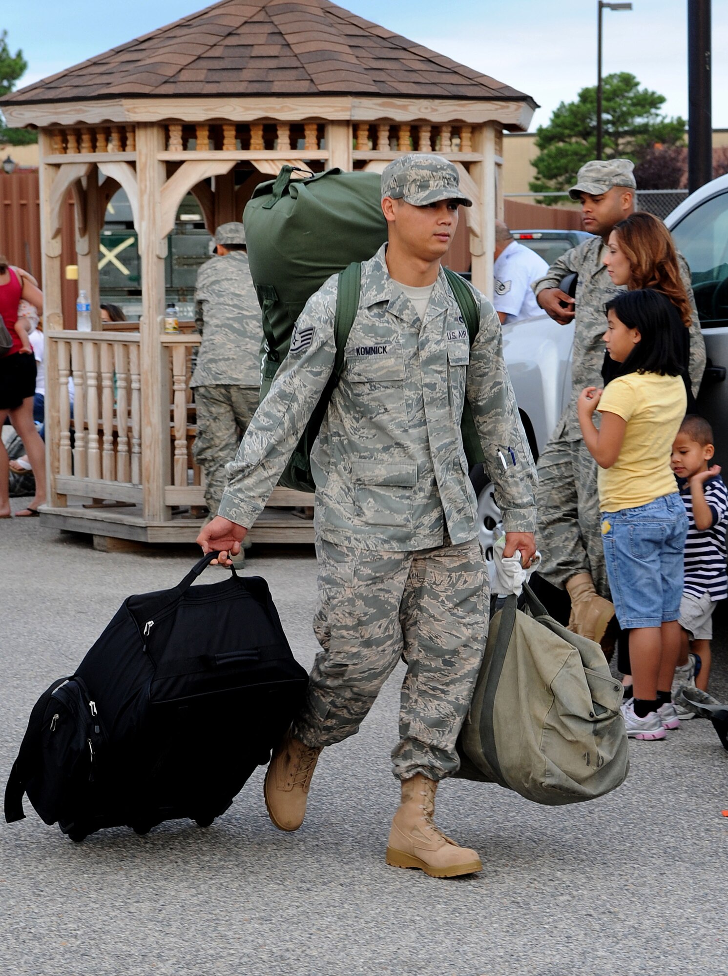 LANGLEY AIRE FORCE BASE, Va. -- Staff Sgt. John Komnick, 633d Civil Engineer Squadron water and fuels system maintenance specialist, prepares to load his baggage in preparation to depart for his deployment to Afghanistan.  Sgt. Komnick and other CE professionals are part of the 877th Expeditionary Prime Base Engineer Emergency Force Squadron, tasked with the construction of forward operating bases for U.S. Central Command.  (U.S. Air Force Photo/Staff Sgt. Christina M. Styer) 