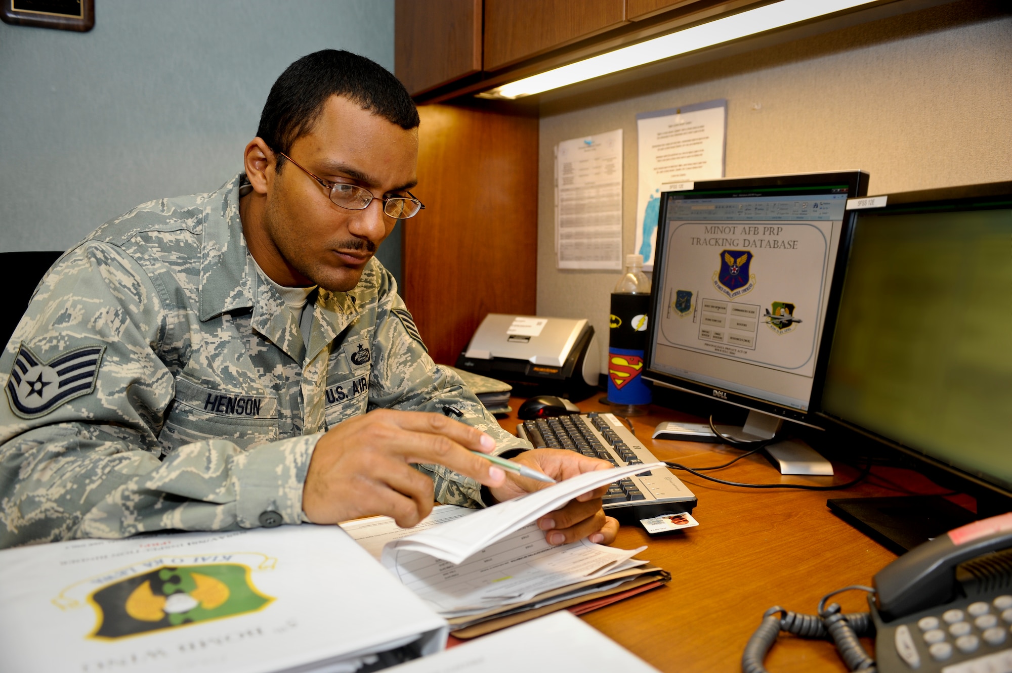 MINOT AIR FORCE BASE, N.D. -- Staff Sgt. Eric Henson, 5th Force Support Squadron base personnel reliability program monitor, inputs information into the Minot AFB PRP tracking database here Aug. 16. Minot is home to the largest PRP program in the Defense Department and home to the only dual-wing, nuclear base in the Air Force. (U.S. Air Force photo by Senior Airman Benjamin Stratton)