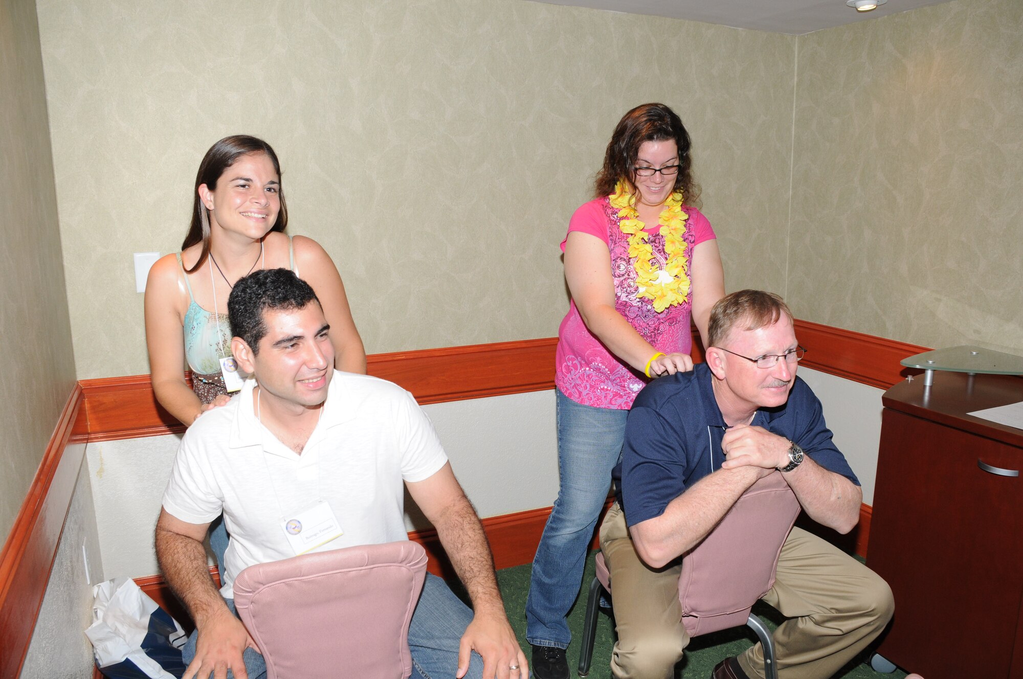 Spouses practice massage techniques during the "Tension Techniques/Massage Therapy" class offered at the Yellow Ribbon Conference. (U.S. Air Force Photo by Capt. Shane Huff)