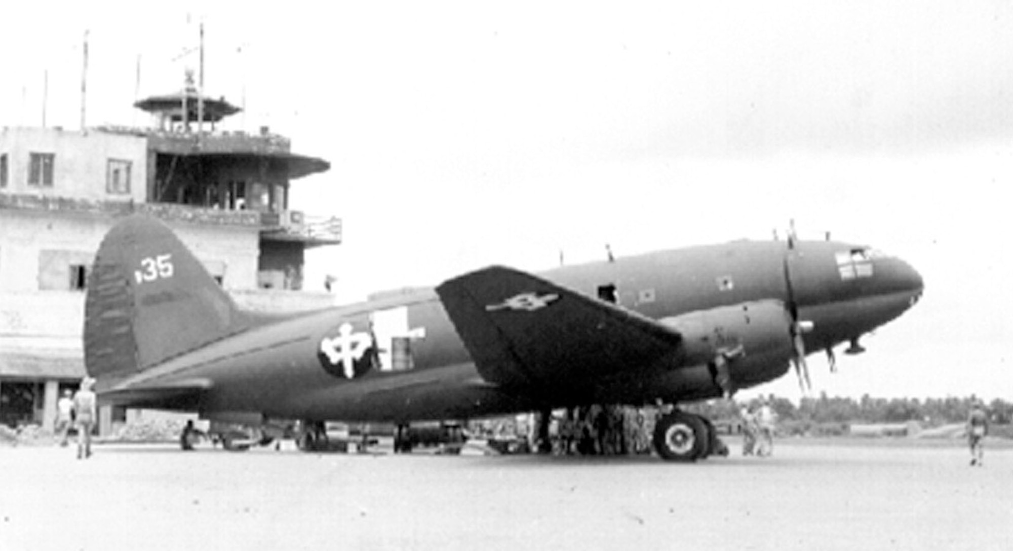 CNAC Curtiss C-46 Commando cargo aircraft being unloaded in China. CNAC carried over 10 percent of all cargo and personnel over the "Hump." (Photo courtesy of cnac.org)