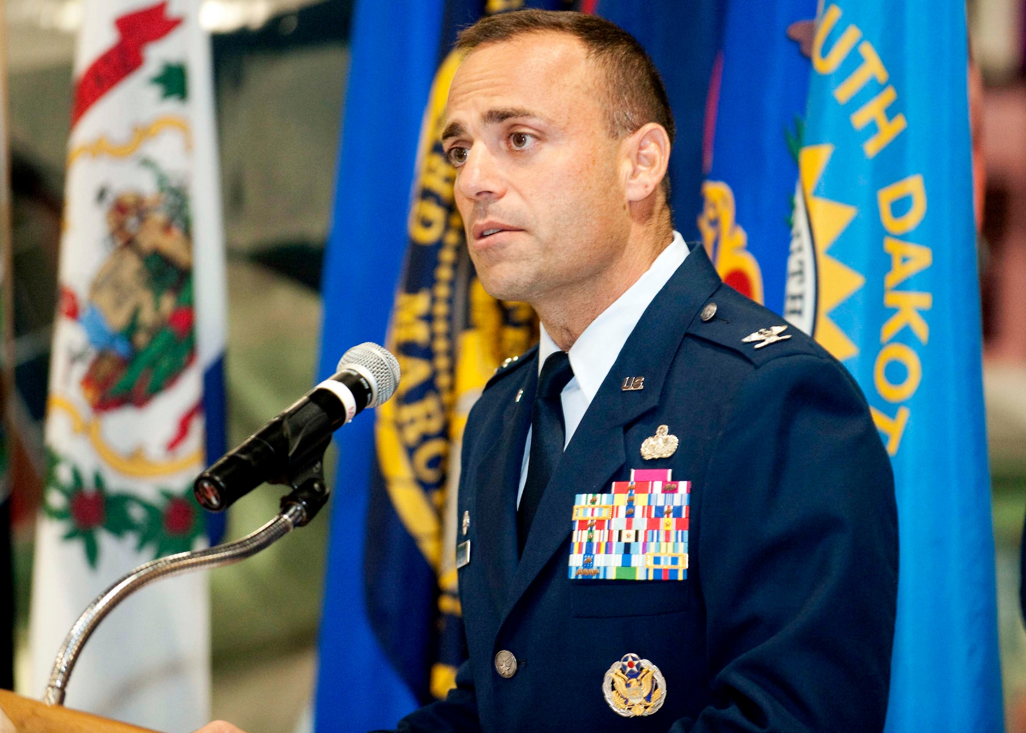 Col. Sal Nodjomian, 96th Air Base Wing commander, speaks during a recent change of command ceremony at the Air Armament Museum.  After a month-long immersion of Eglin's units and missions, the colonel developed his vision and goals for the base.  (U.S. Air Force photo/Debi Haussermann.)