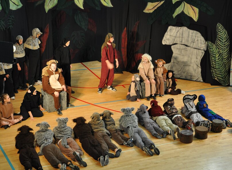 LAUGHLIN AIR FORCE BASE, Texas -- A group of Laughlin’s youth joins the Missoula Children’s Theatre group in a production of The Jungle Book at the Losano Fitness Center here August 13. The traveling theatre group visits numerous locations across the country and auditions local young people to join them in their productions. (U.S. Air Force photo by Airman 1st Class Blake Mize)